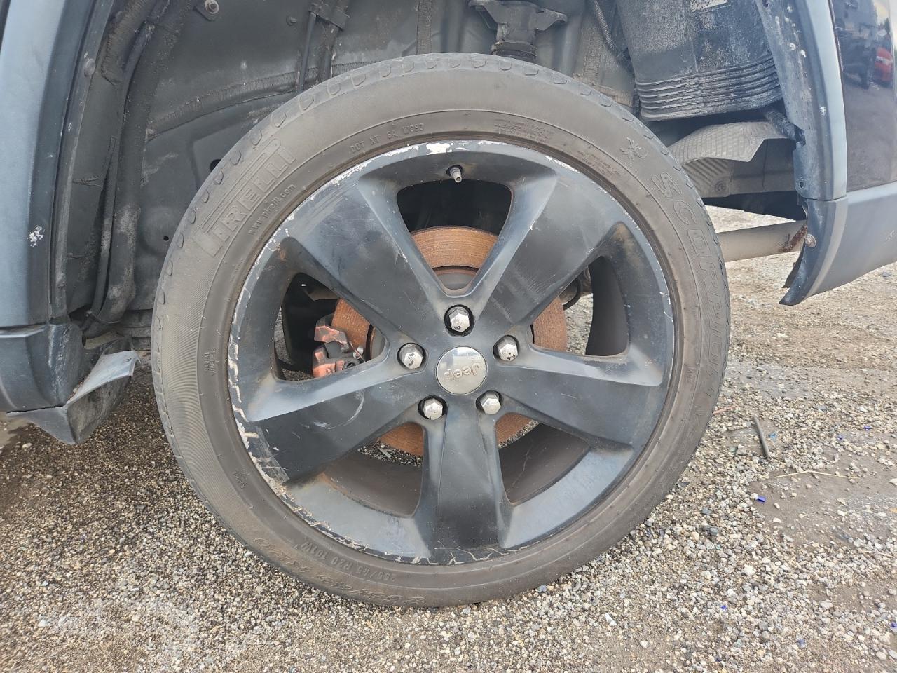 2014 Jeep Grand Cherokee Limited Black vin: 1C4RJFBT0EC226995 Damage: Left Rear Wheel, Curb Rash, > 12 Inches