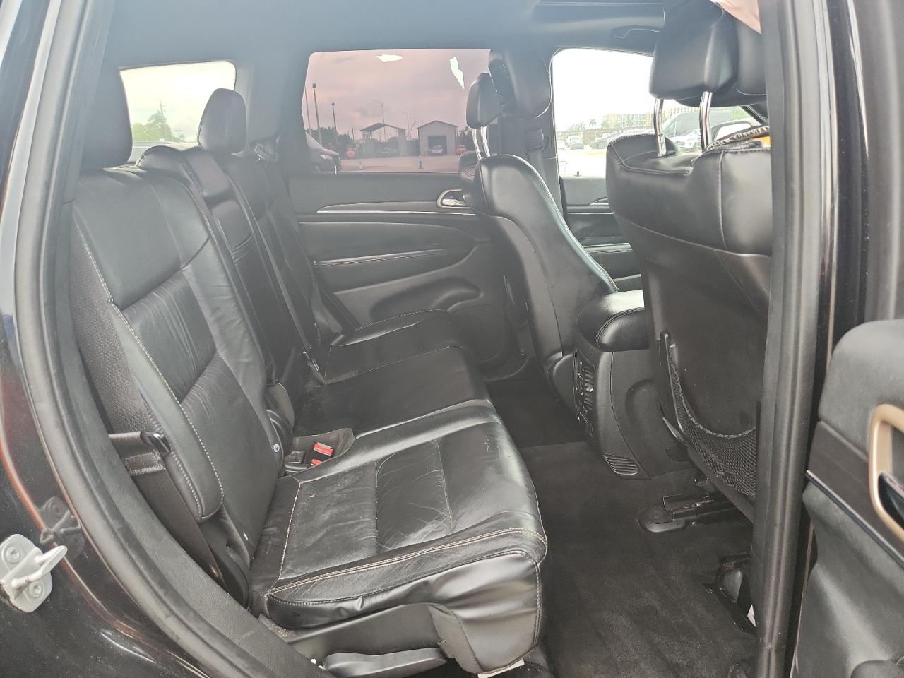 2014 Jeep Grand Cherokee Limited Black vin: 1C4RJFBT0EC226995 Damage: Door Glass Tint - Rear Left, Peeling, Replacement Required