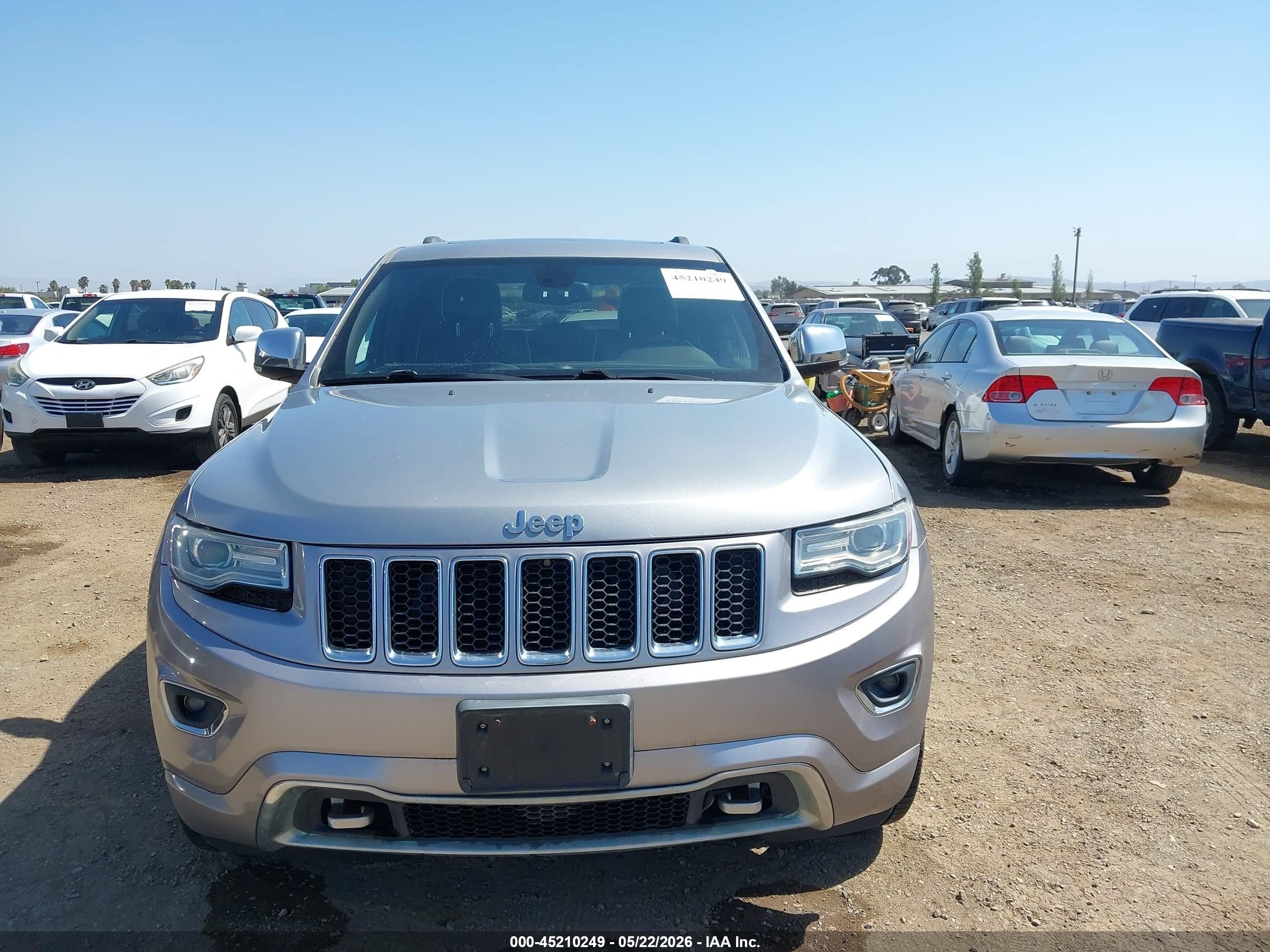 2014 Jeep Grand Cherokee Overland Silver vin: 1C4RJFCG4EC265039