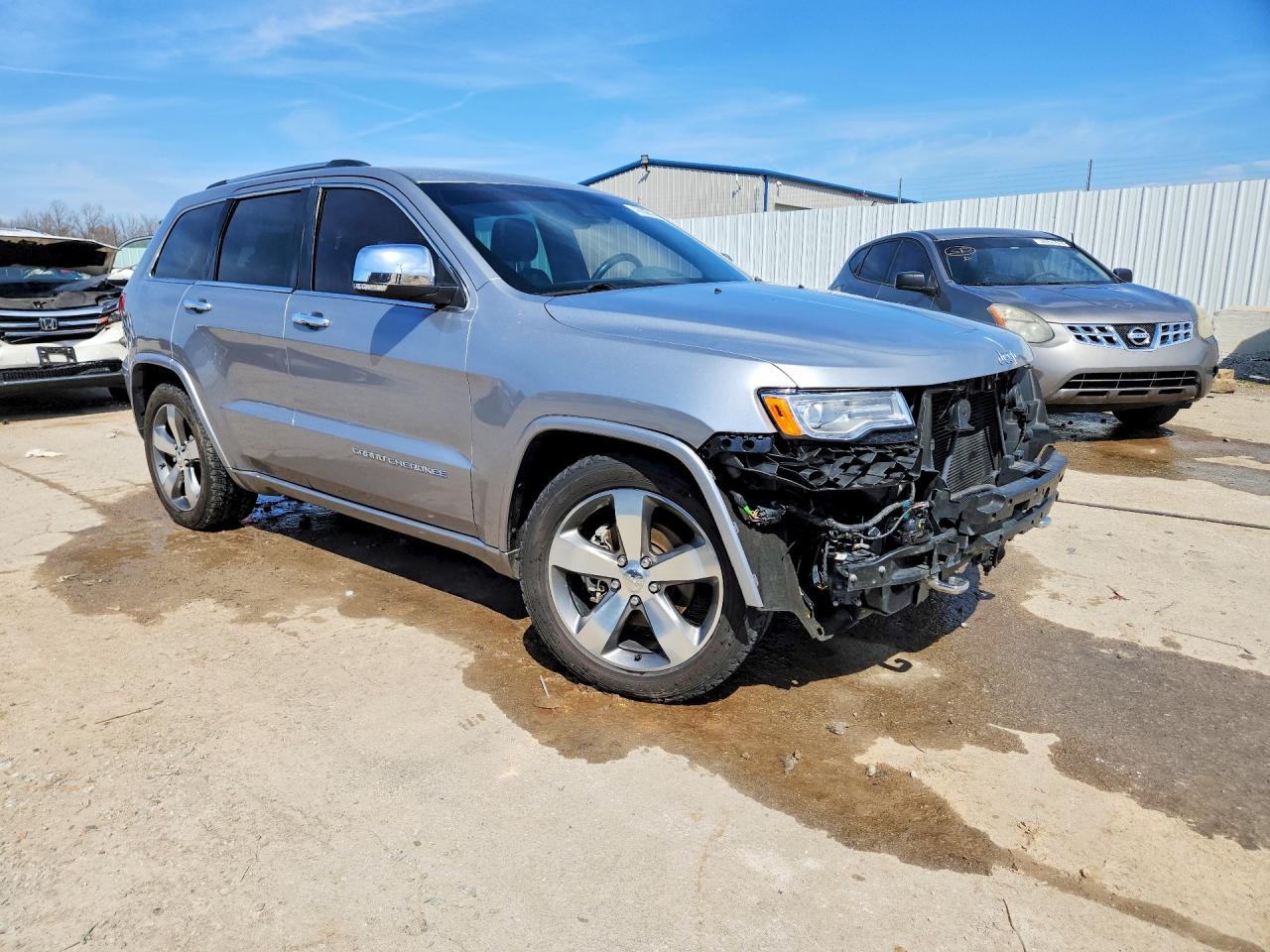2014 Jeep Grand Cherokee Overland Silver vin: 1C4RJFCG5EC260268