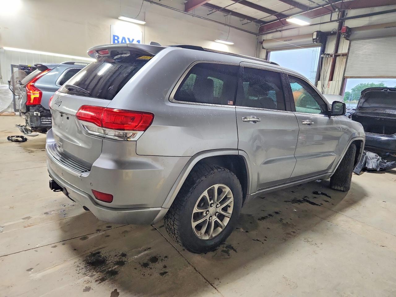 2014 Jeep Grand Cherokee Overland Серебряный vin: 1C4RJFCG6EC200175