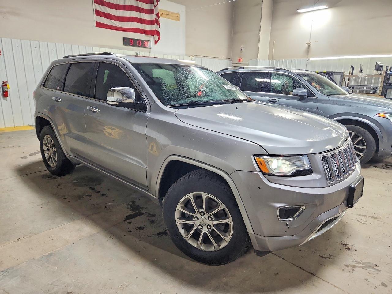 2014 Jeep Grand Cherokee Overland Серебряный vin: 1C4RJFCG6EC200175