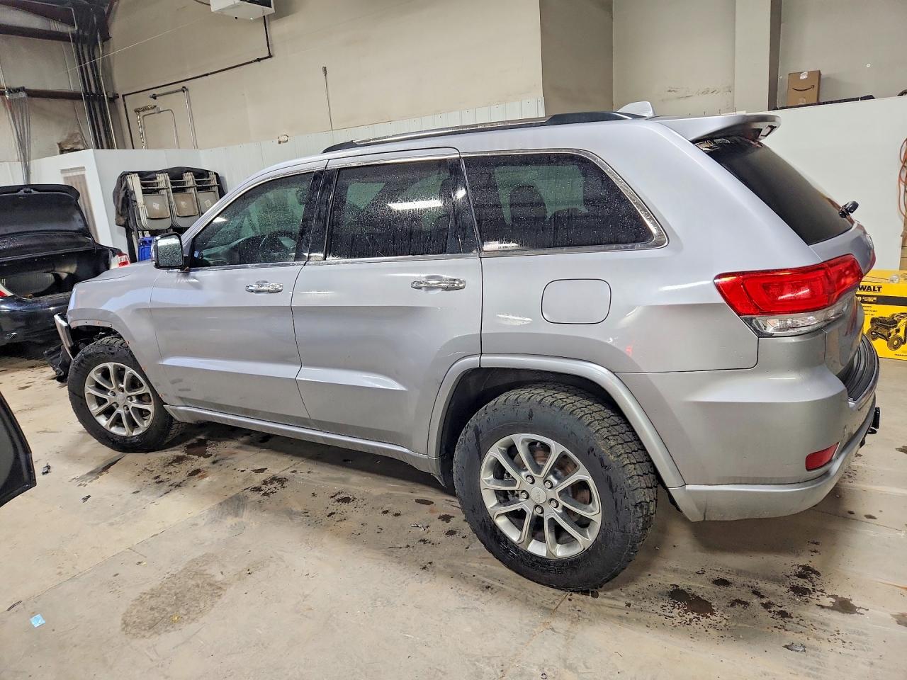 2014 Jeep Grand Cherokee Overland Серебряный vin: 1C4RJFCG6EC200175