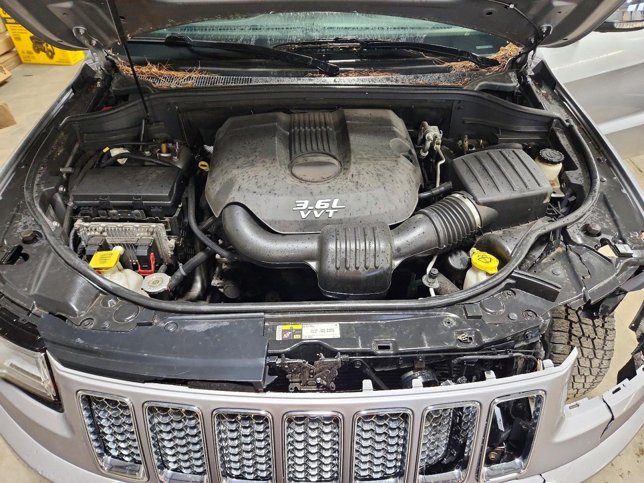 2014 Jeep Grand Cherokee Overland Серебряный vin: 1C4RJFCG6EC200175