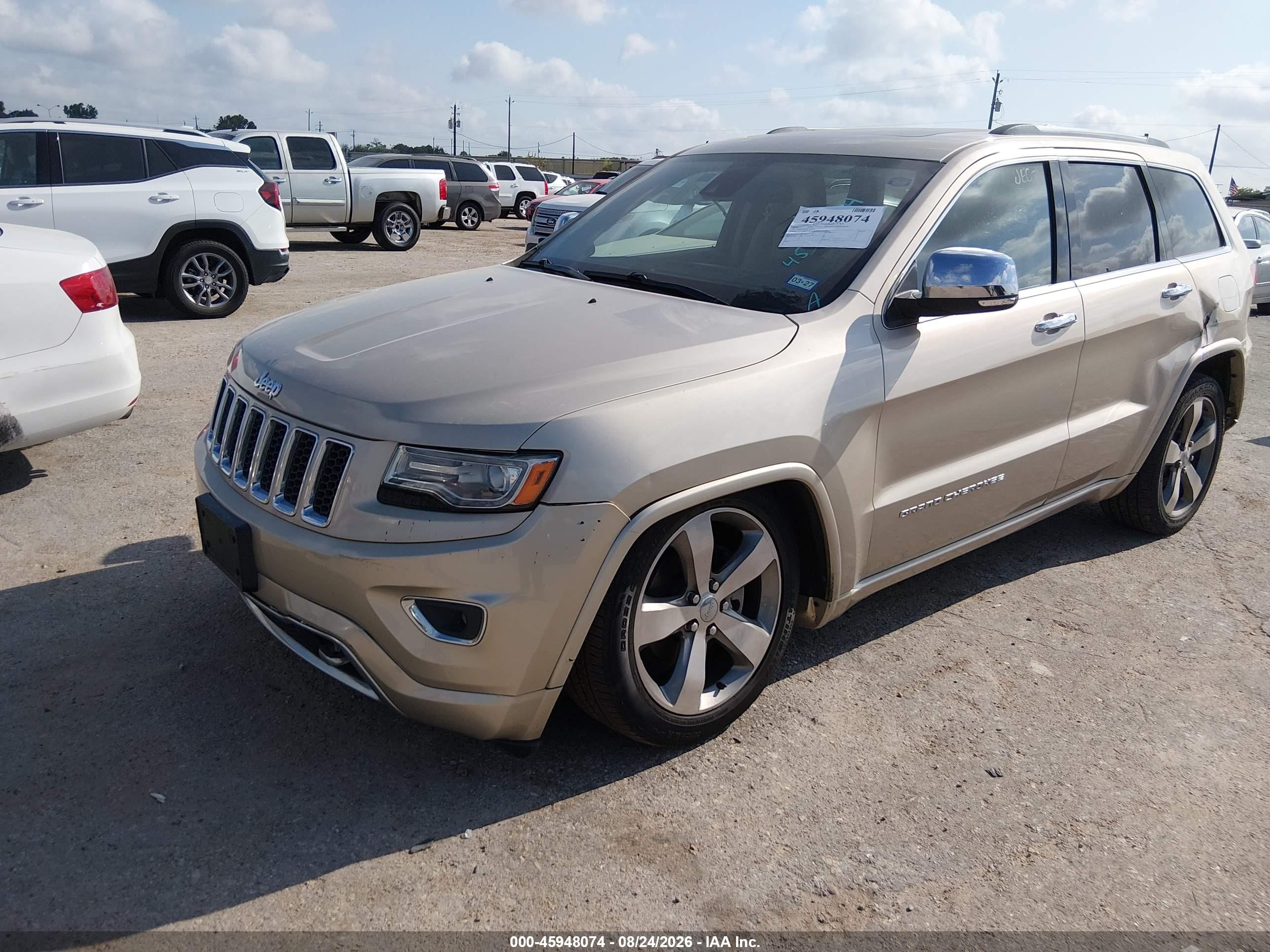2014 Jeep Grand Cherokee Overland Золотой vin: 1C4RJFCG6EC211354