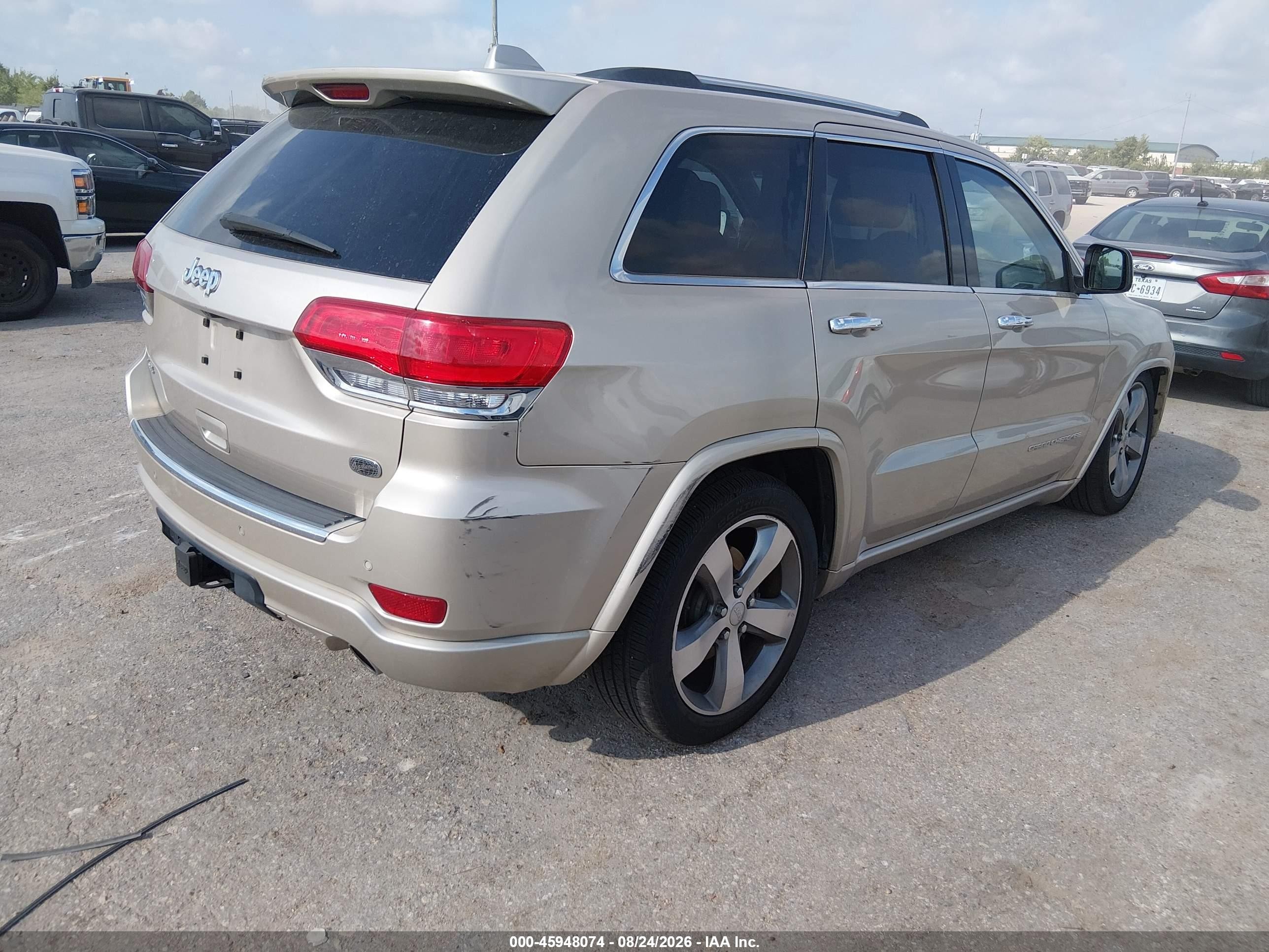 2014 Jeep Grand Cherokee Overland Золотой vin: 1C4RJFCG6EC211354