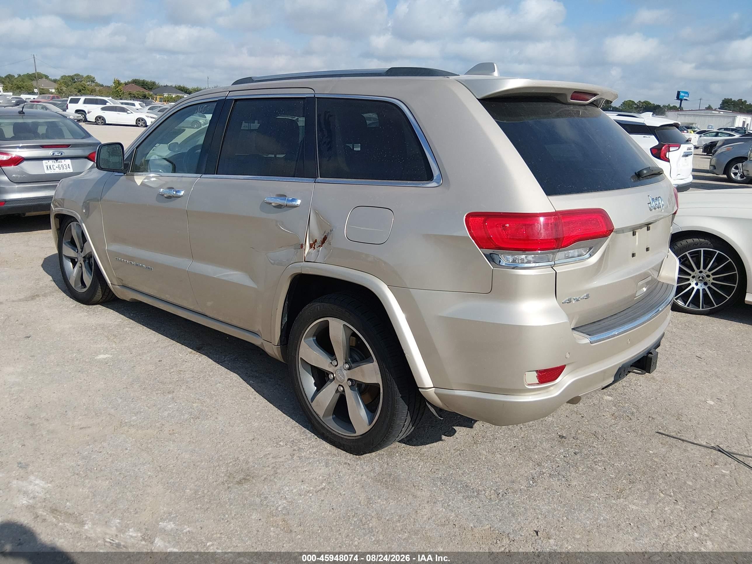 2014 Jeep Grand Cherokee Overland Золотой vin: 1C4RJFCG6EC211354