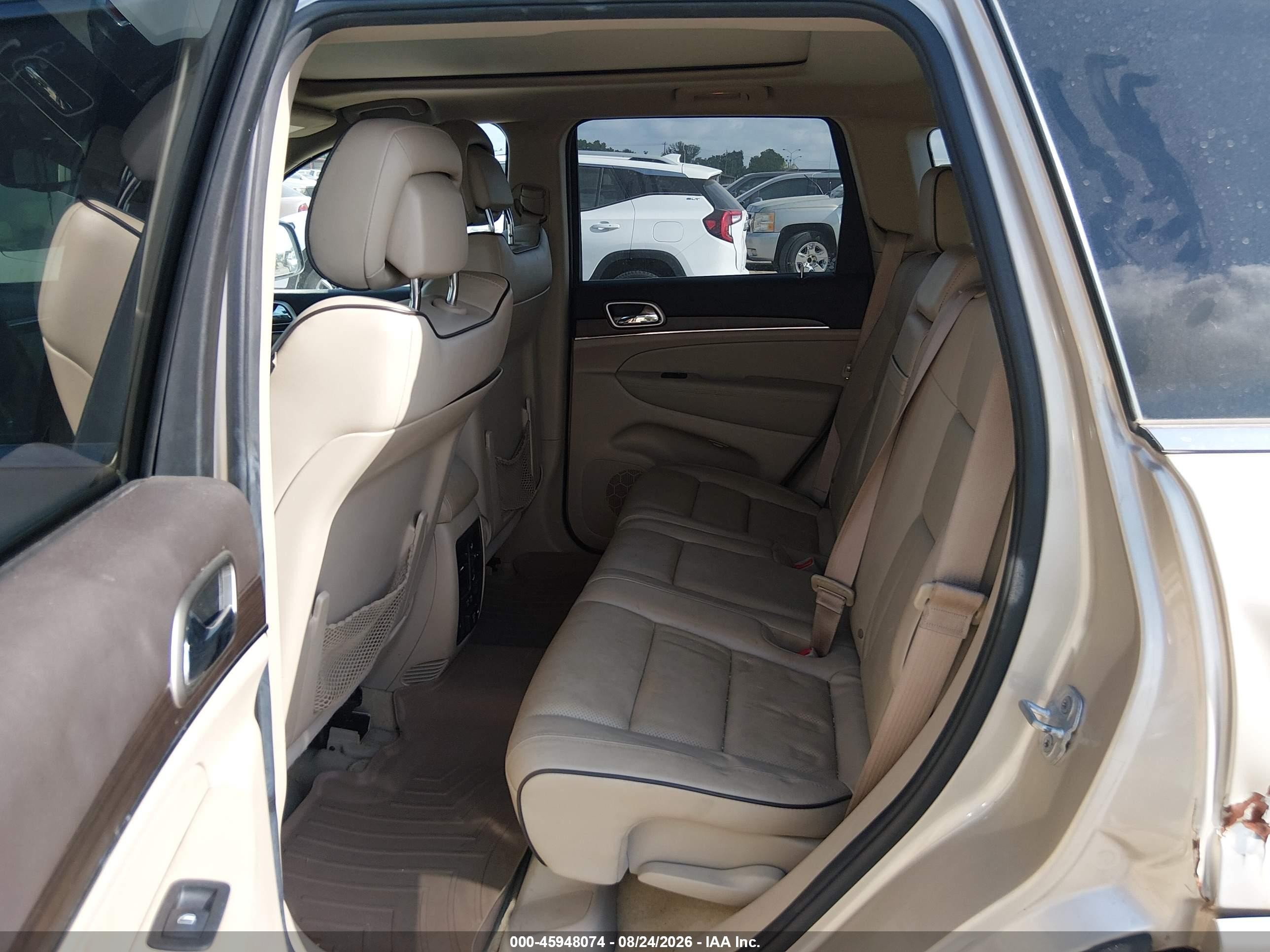 2014 Jeep Grand Cherokee Overland Золотой vin: 1C4RJFCG6EC211354