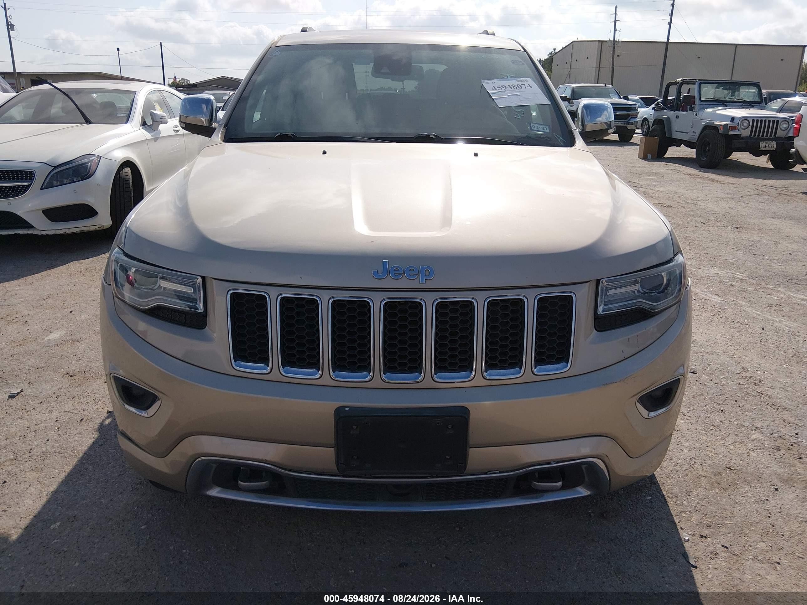 2014 Jeep Grand Cherokee Overland Золотой vin: 1C4RJFCG6EC211354
