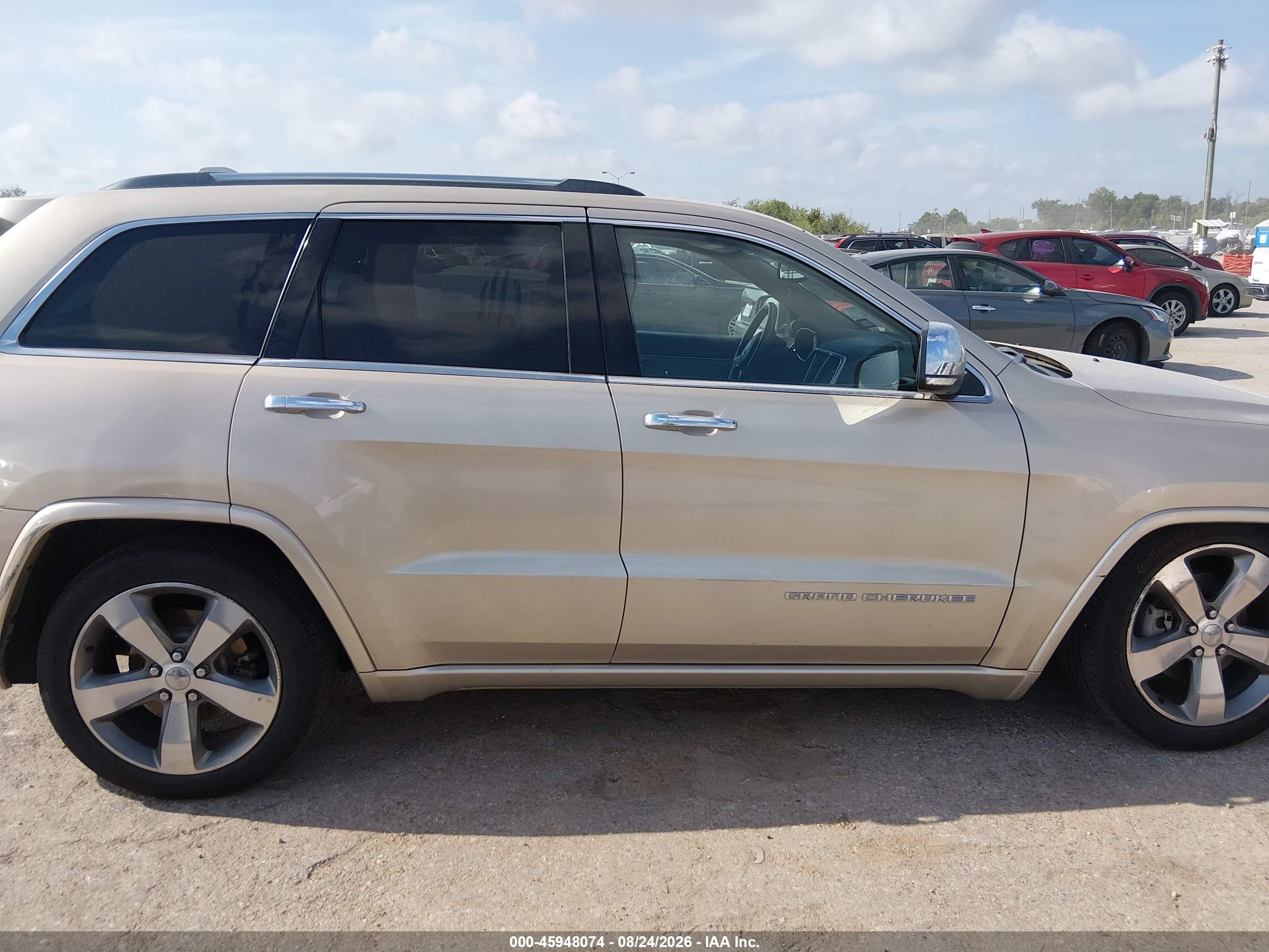 2014 Jeep Grand Cherokee Overland Золотой vin: 1C4RJFCG6EC211354