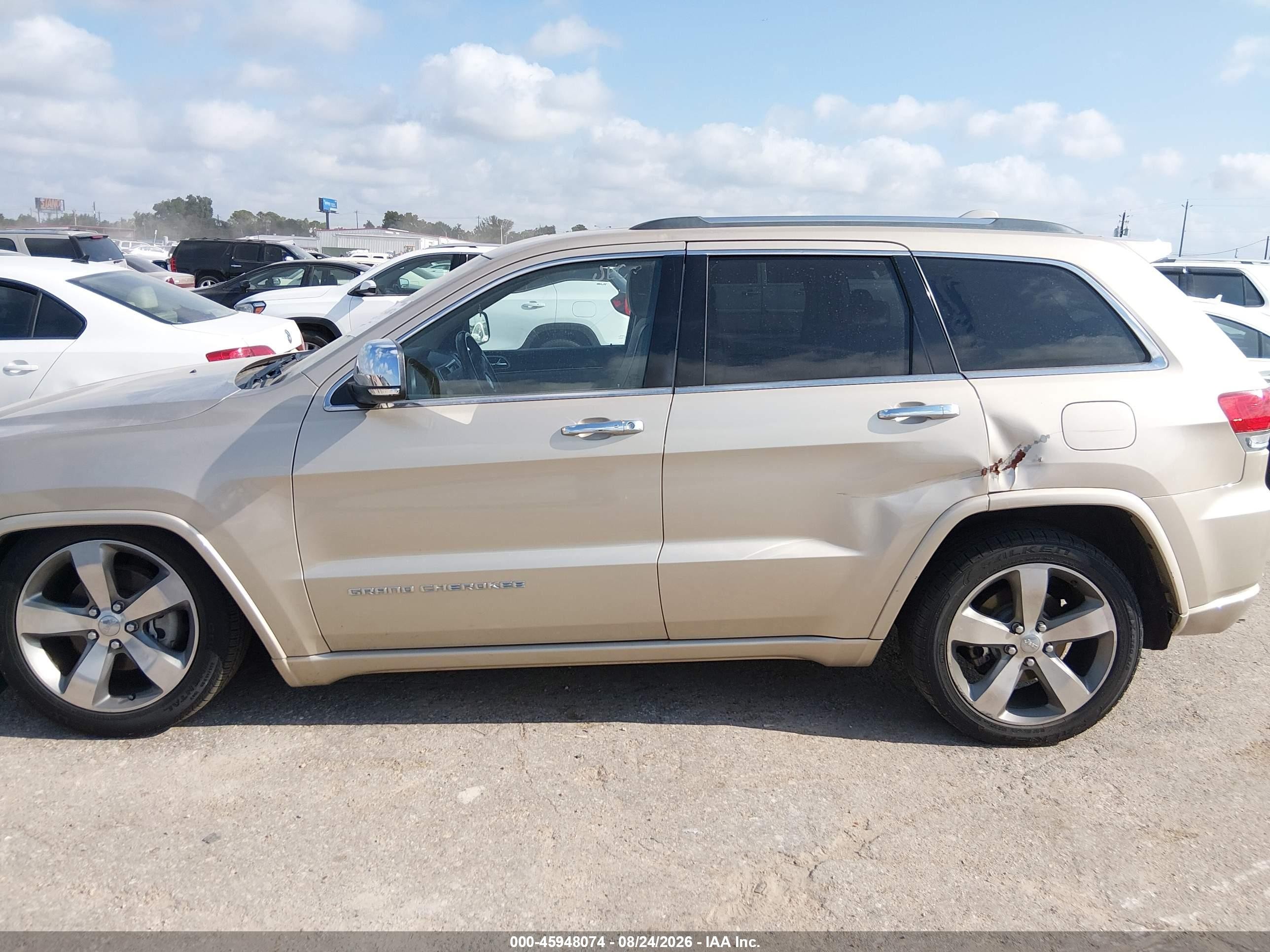 2014 Jeep Grand Cherokee Overland Золотой vin: 1C4RJFCG6EC211354