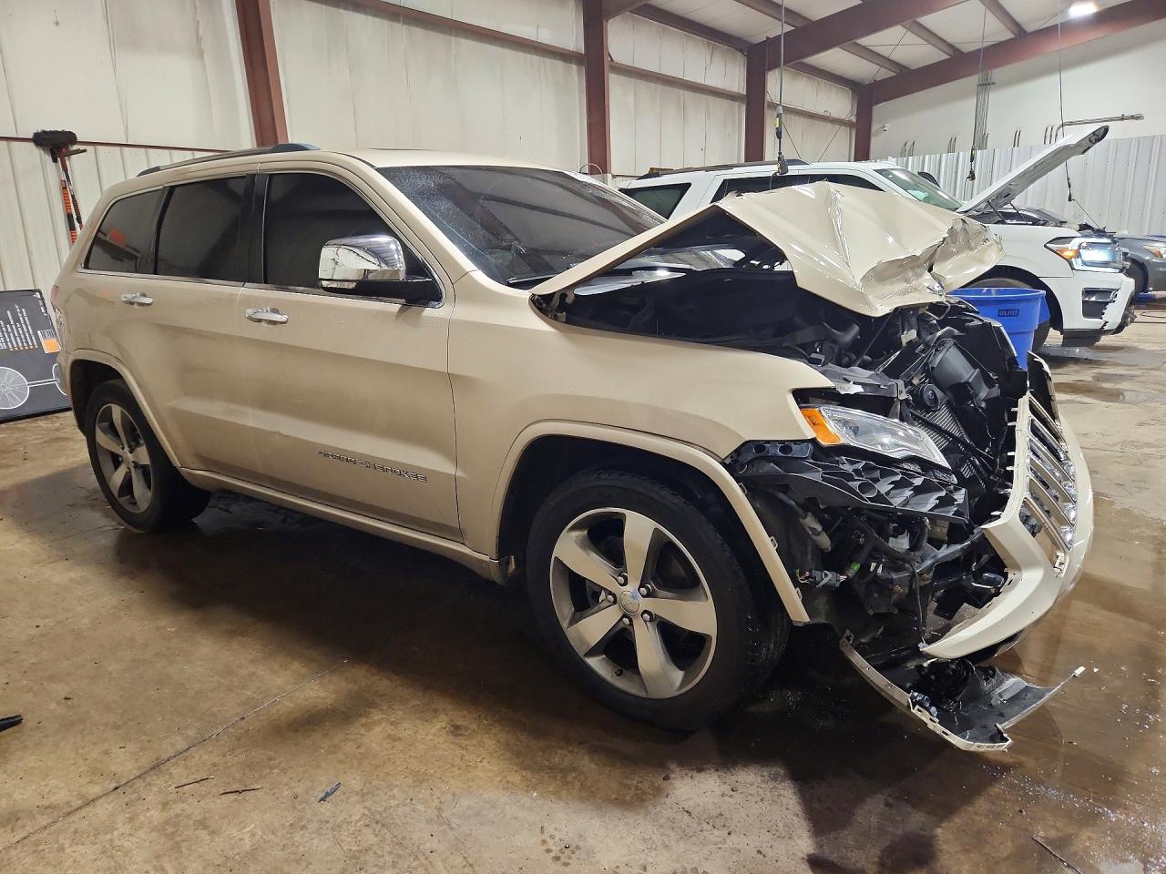 2015 Jeep Grand Cherokee Overland Tan vin: 1C4RJFCG6FC914180