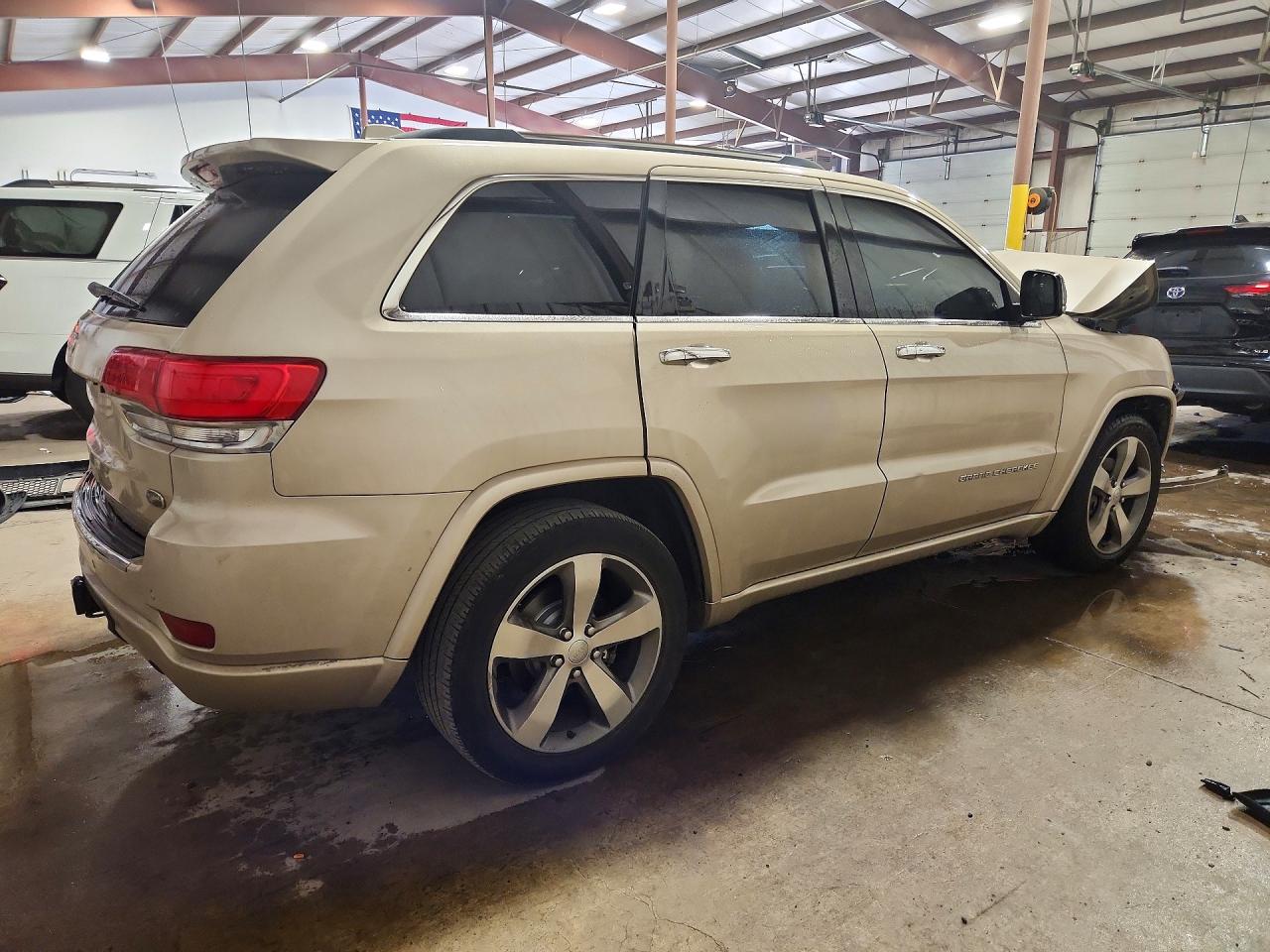 2015 Jeep Grand Cherokee Overland Tan vin: 1C4RJFCG6FC914180