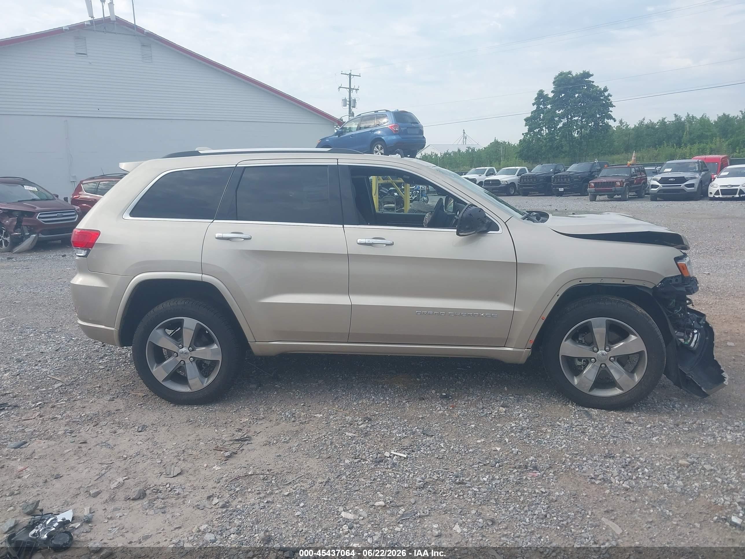 2014 Jeep Grand Cherokee Overland Желто-коричневый vin: 1C4RJFCG8EC152985