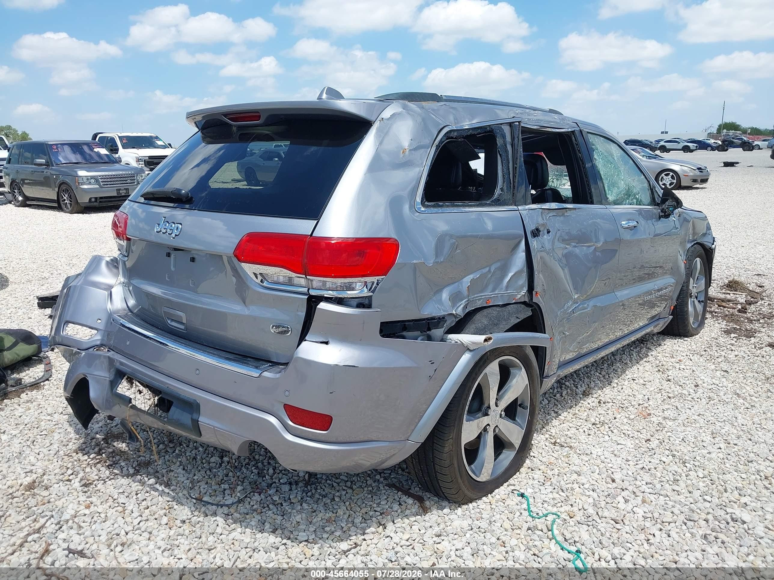 2014 Jeep Grand Cherokee Overland Серебряный vin: 1C4RJFCG8EC232593