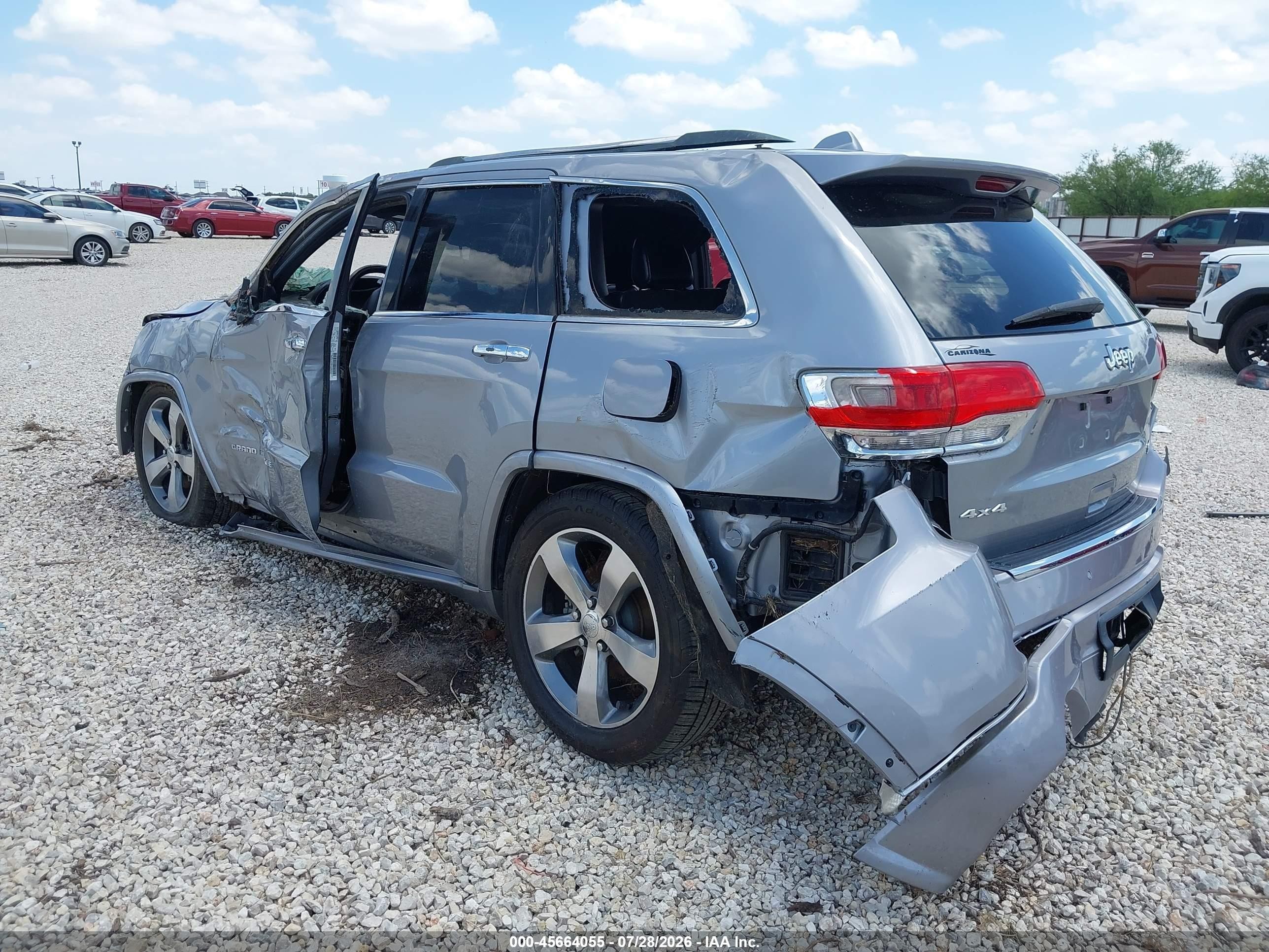 2014 Jeep Grand Cherokee Overland Серебряный vin: 1C4RJFCG8EC232593