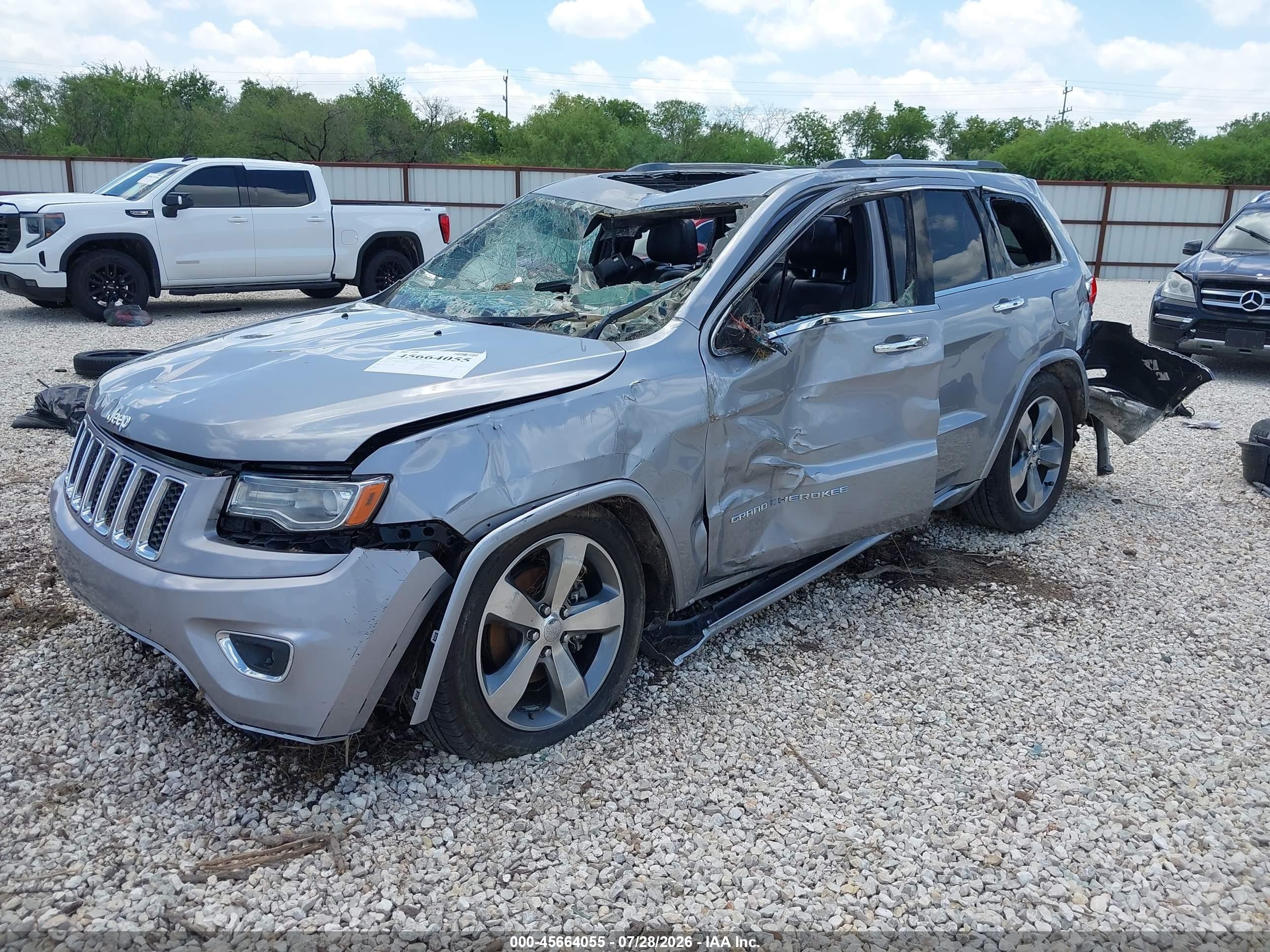 2014 Jeep Grand Cherokee Overland Серебряный vin: 1C4RJFCG8EC232593