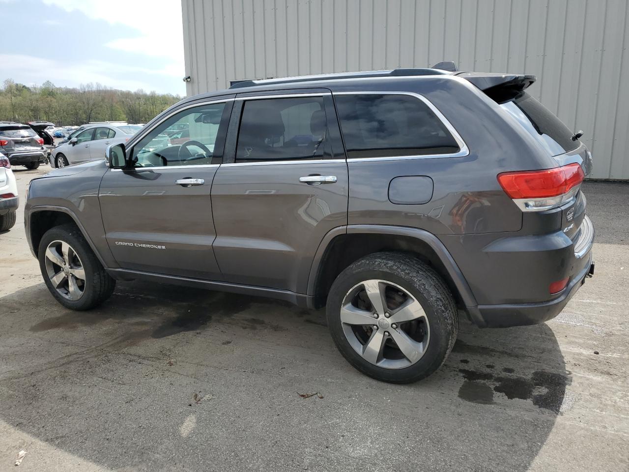 2014 Jeep Grand Cherokee Overland Gray vin: 1C4RJFCG9EC535852 Damage: Left Rear Door, Dent(S) W/ Paint Dmg, 1/8 To 1/2 Inch