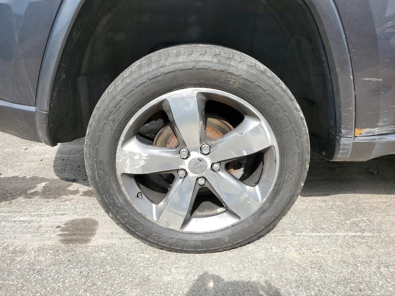 2014 Jeep Grand Cherokee Overland Gray vin: 1C4RJFCG9EC535852 Damage: Right Rear Wheel, Curb Rash, > 12 Inches