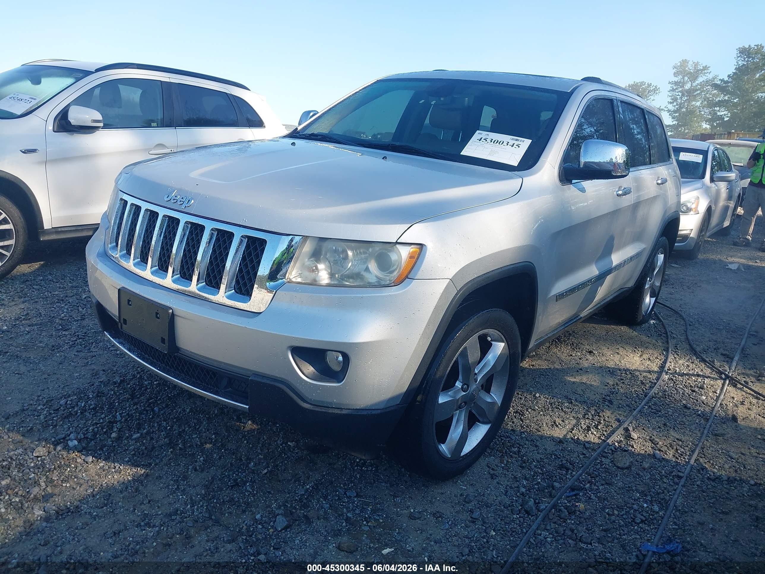 2012 Jeep Grand Cherokee Overland Silver vin: 1C4RJFCGXCC208244