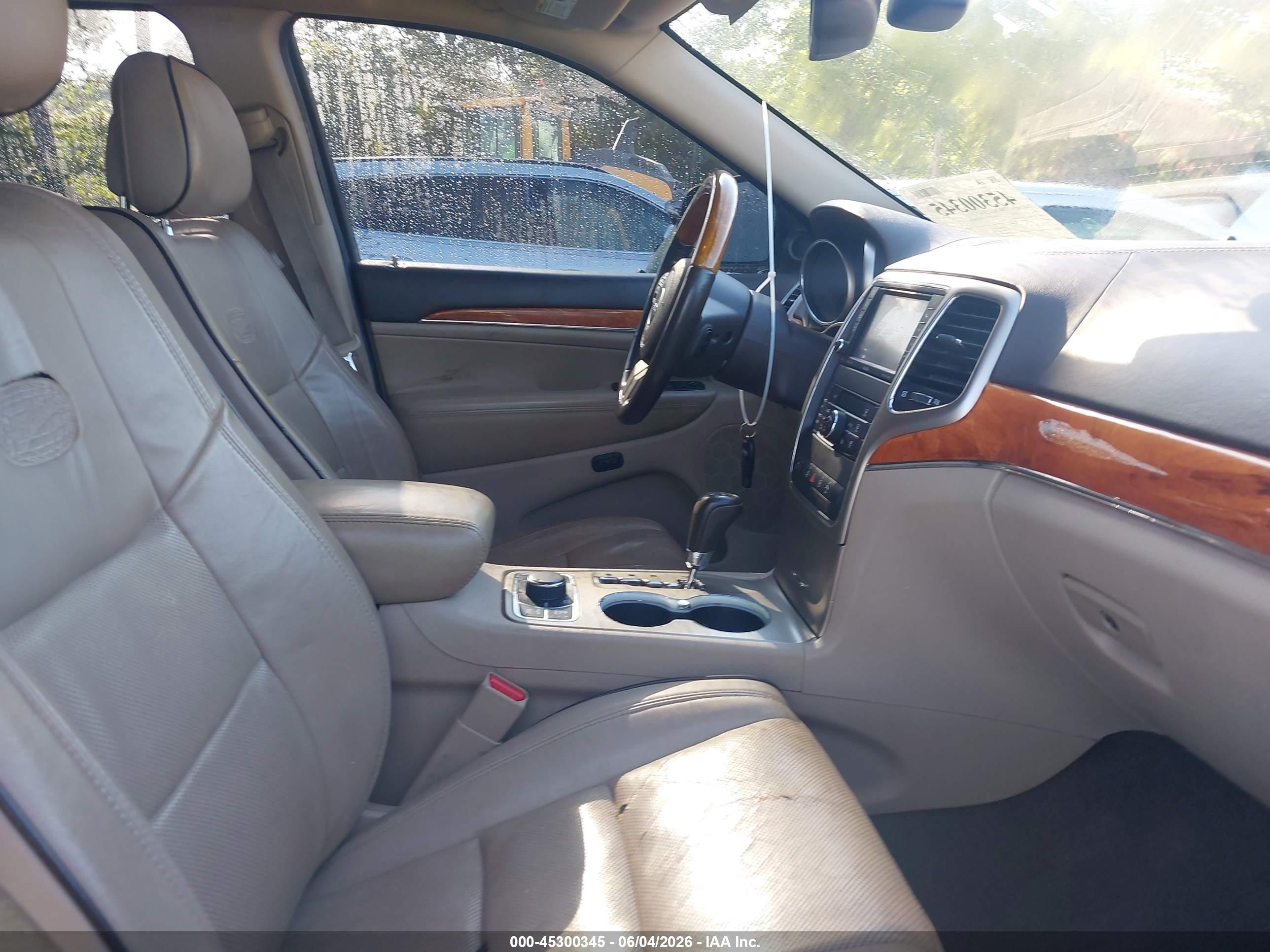 2012 Jeep Grand Cherokee Overland Silver vin: 1C4RJFCGXCC208244