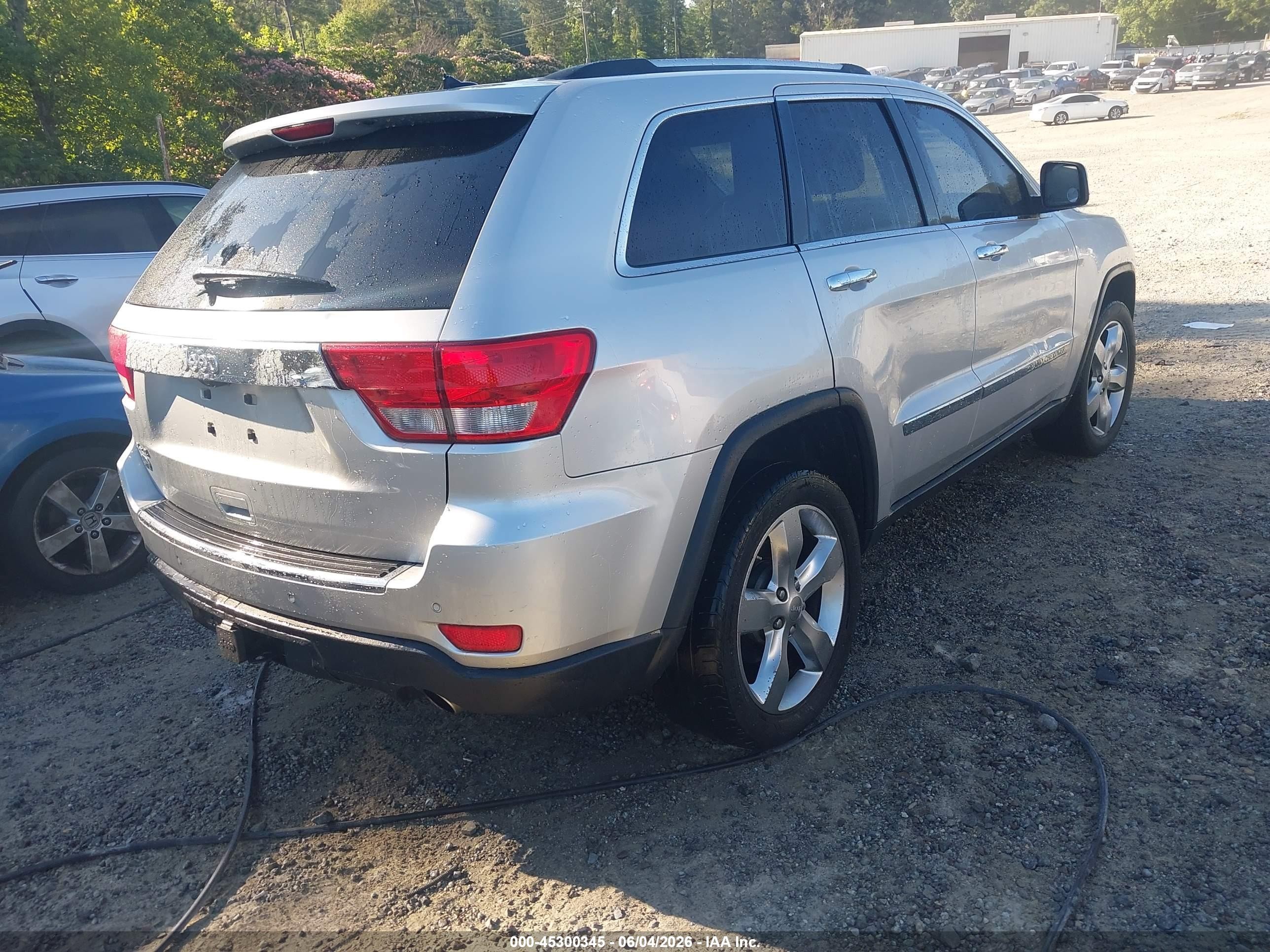 2012 Jeep Grand Cherokee Overland Silver vin: 1C4RJFCGXCC208244