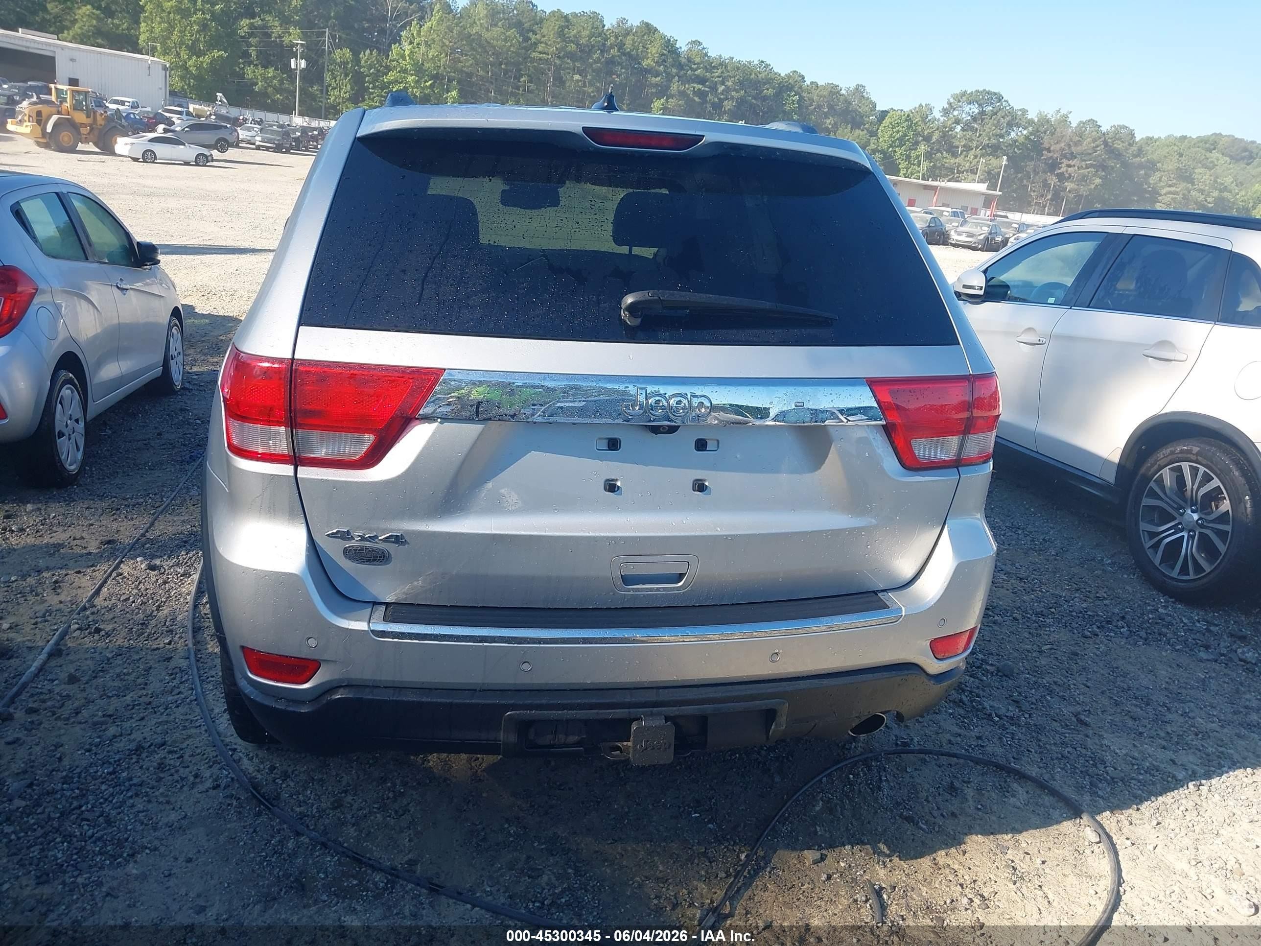 2012 Jeep Grand Cherokee Overland Silver vin: 1C4RJFCGXCC208244