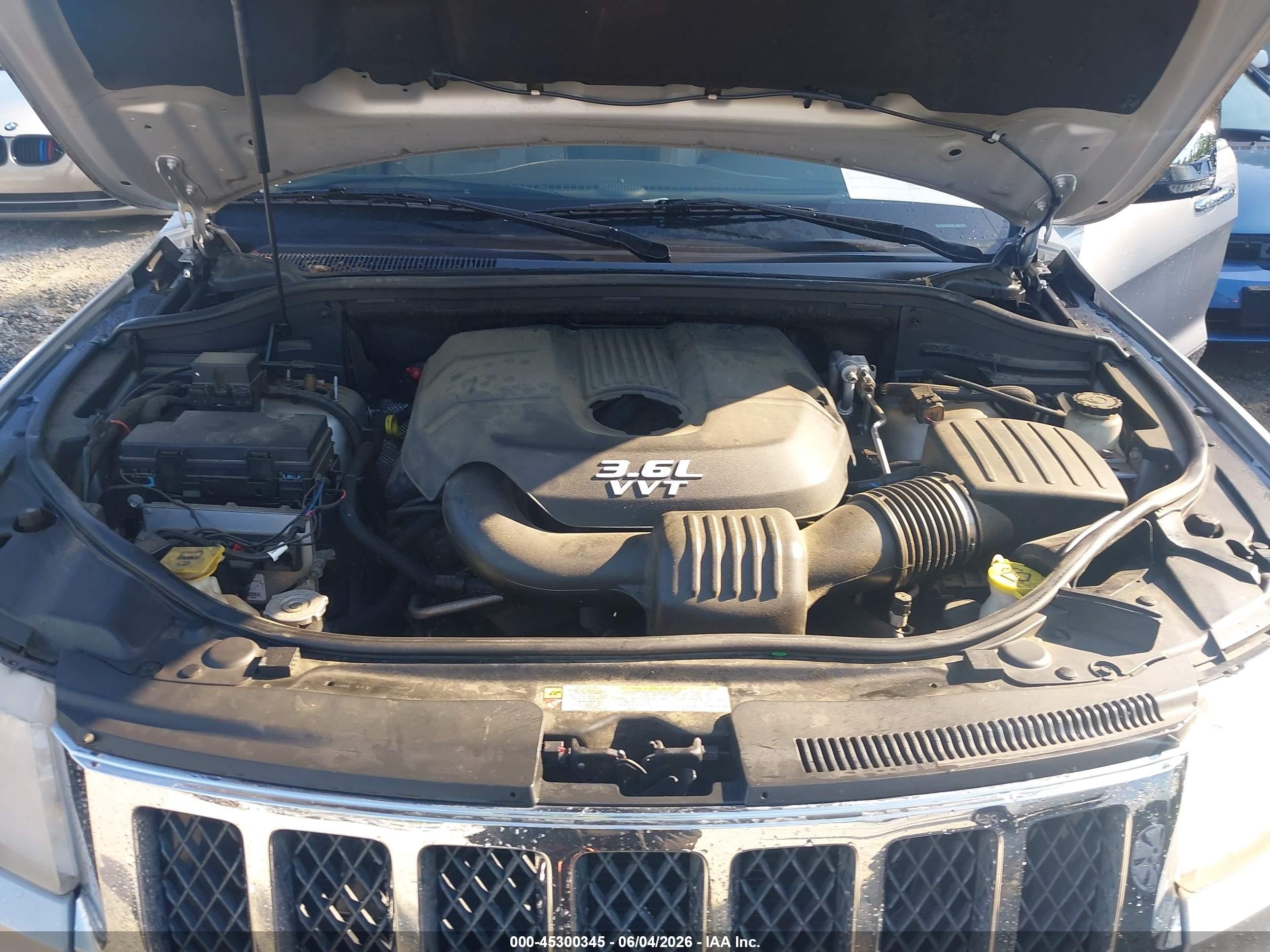 2012 Jeep Grand Cherokee Overland Silver vin: 1C4RJFCGXCC208244