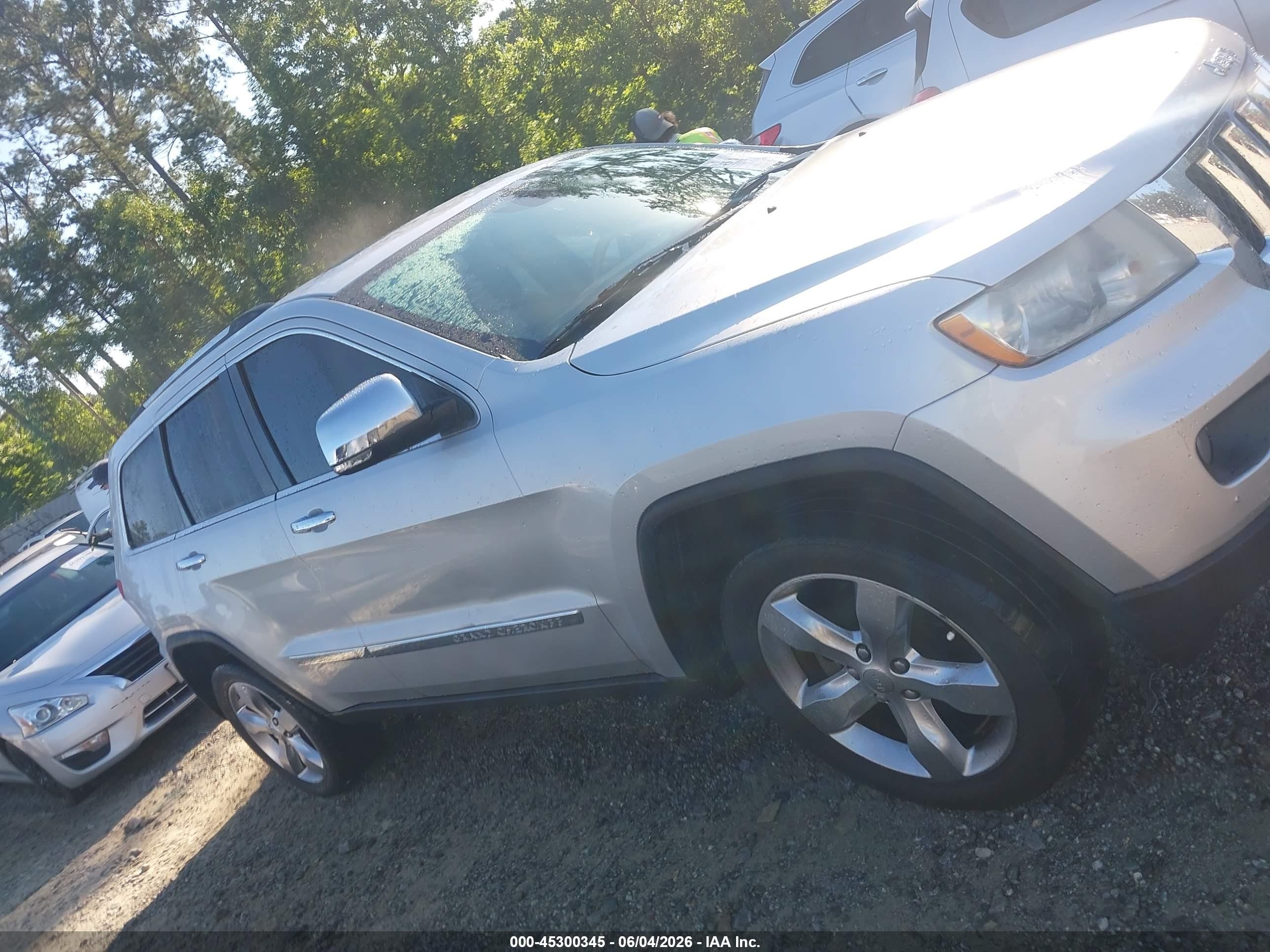 2012 Jeep Grand Cherokee Overland Silver vin: 1C4RJFCGXCC208244