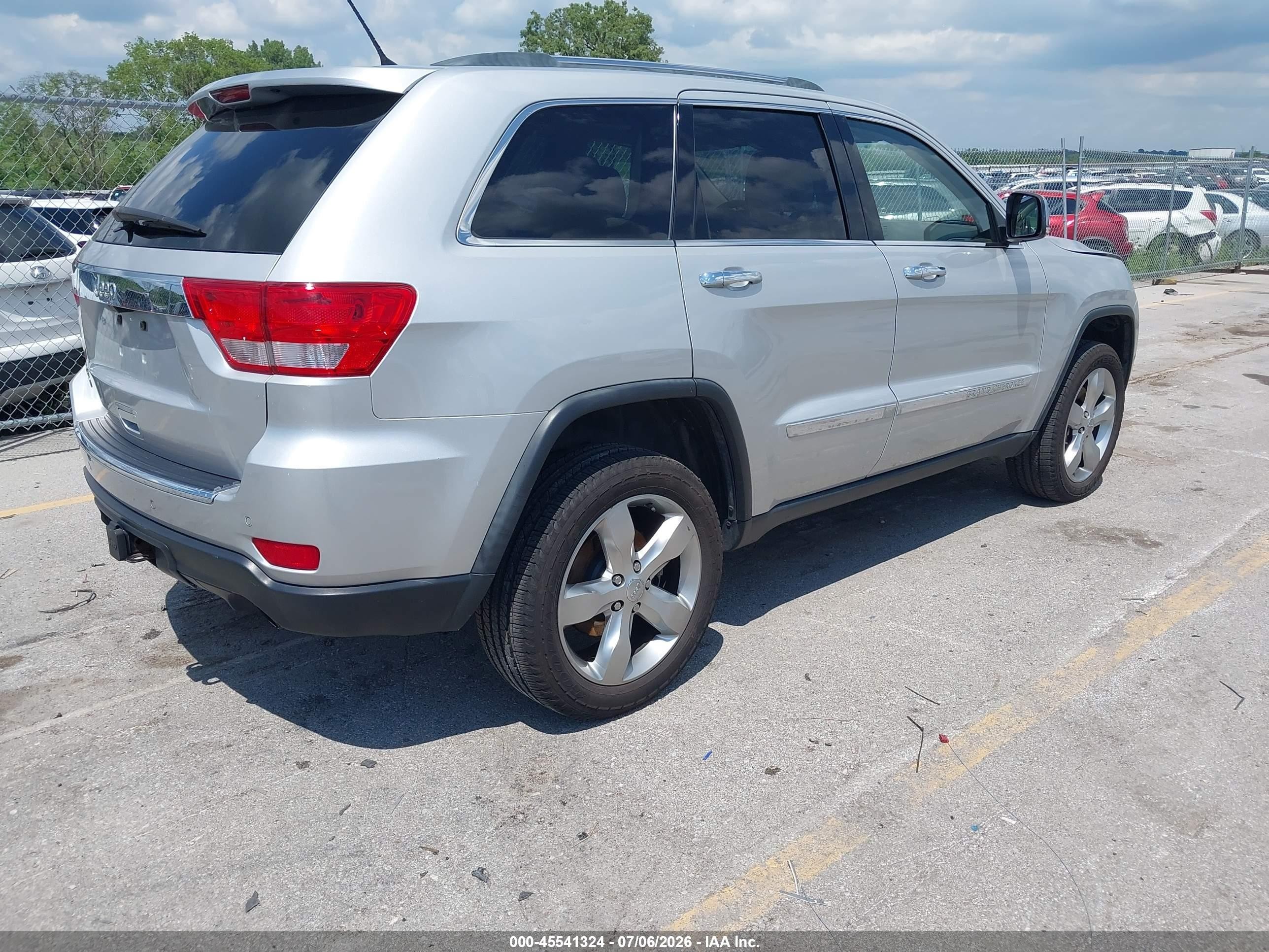 2012 Jeep Grand Cherokee Overland Silver vin: 1C4RJFCT2CC203102
