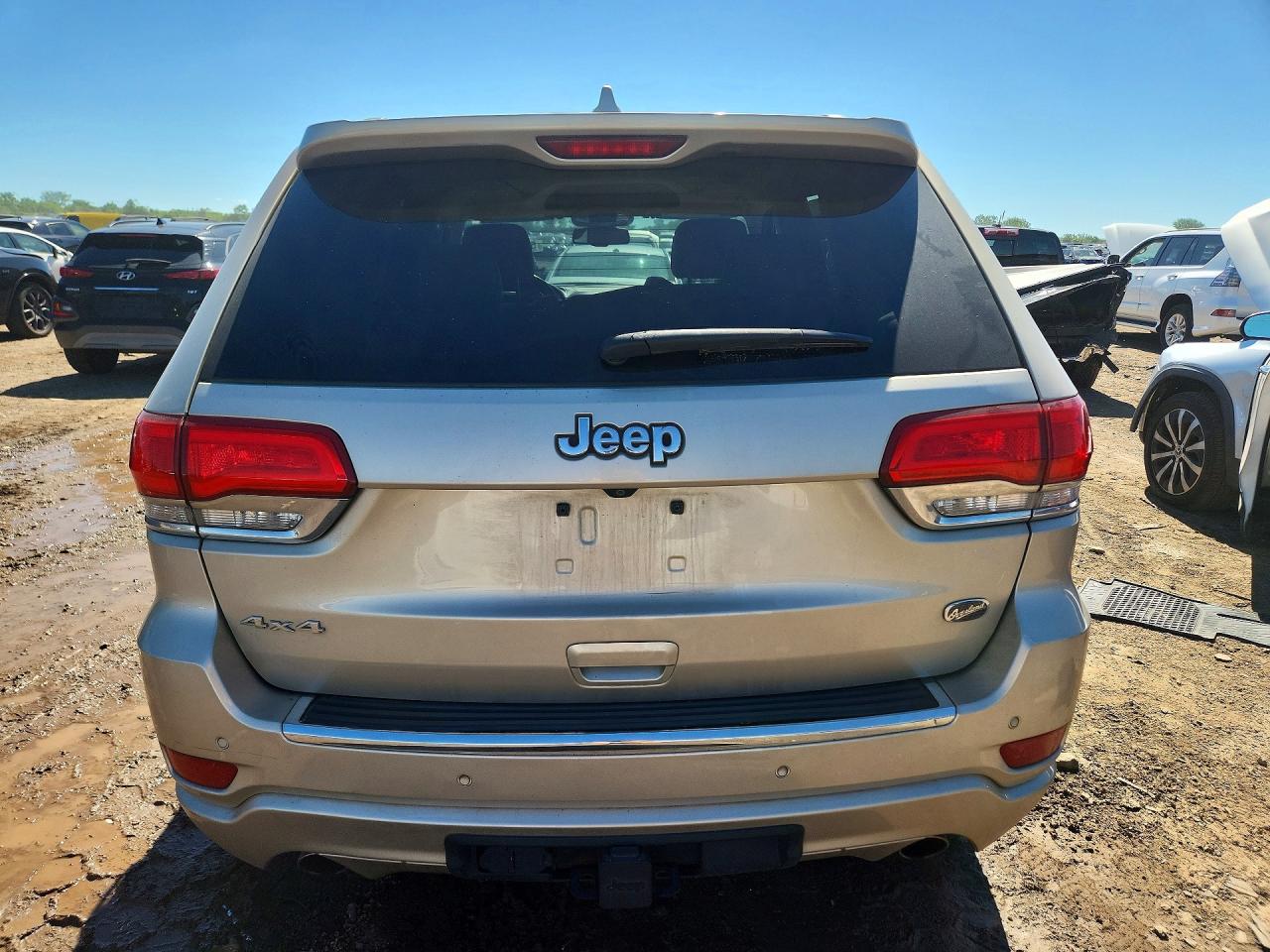 2014 Jeep Grand Cherokee Overland Tan vin: 1C4RJFCT2EC148122