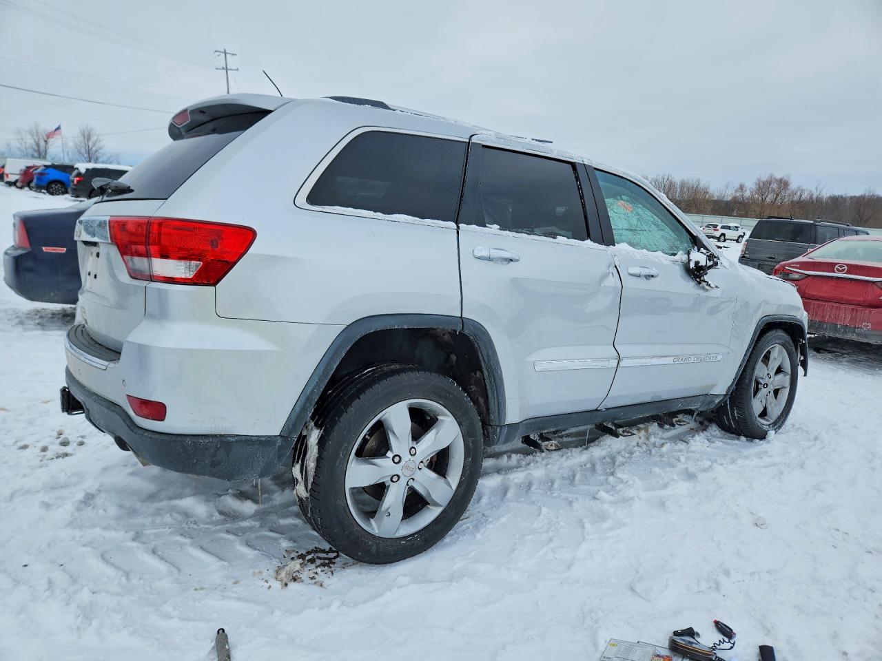 2012 Jeep Grand Cherokee Overland Silver vin: 1C4RJFCT5CC274360