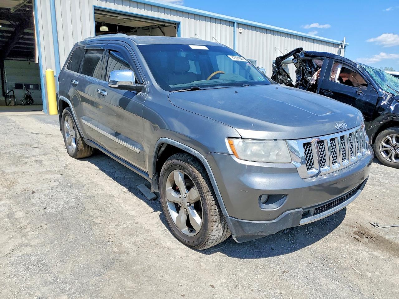 2012 Jeep Grand Cherokee Overland Silver vin: 1C4RJFCT9CC144162