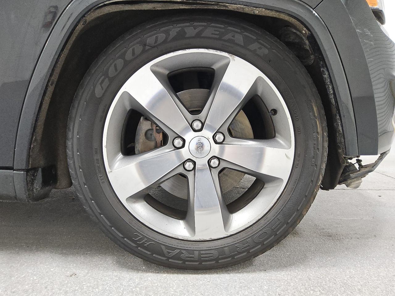 2014 Jeep Grand Cherokee Overland Black vin: 1C4RJFCT9EC528008 Damage: Right Front Wheel, Curb Rash, > 12 Inches