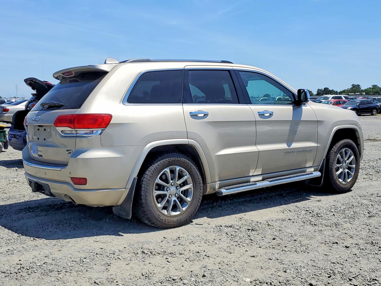 2014 Jeep Grand Cherokee Overland Gold vin: 1C4RJFCTXEC396232