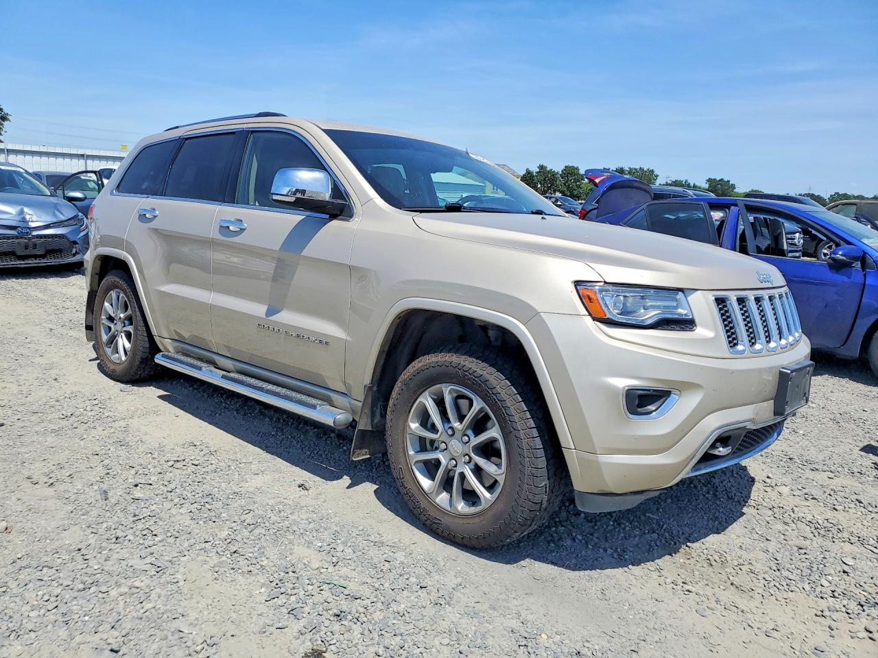 2014 Jeep Grand Cherokee Overland Gold vin: 1C4RJFCTXEC396232