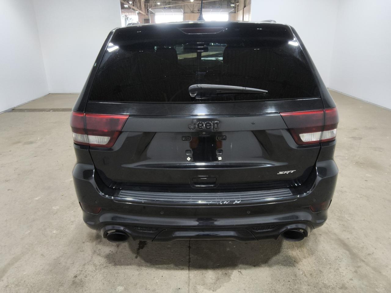 2012 Jeep Grand Cherokee Srt-8 Black vin: 1C4RJFDJ1CC289063 Damage: Right Tail Light, Aftermarket, Acceptable