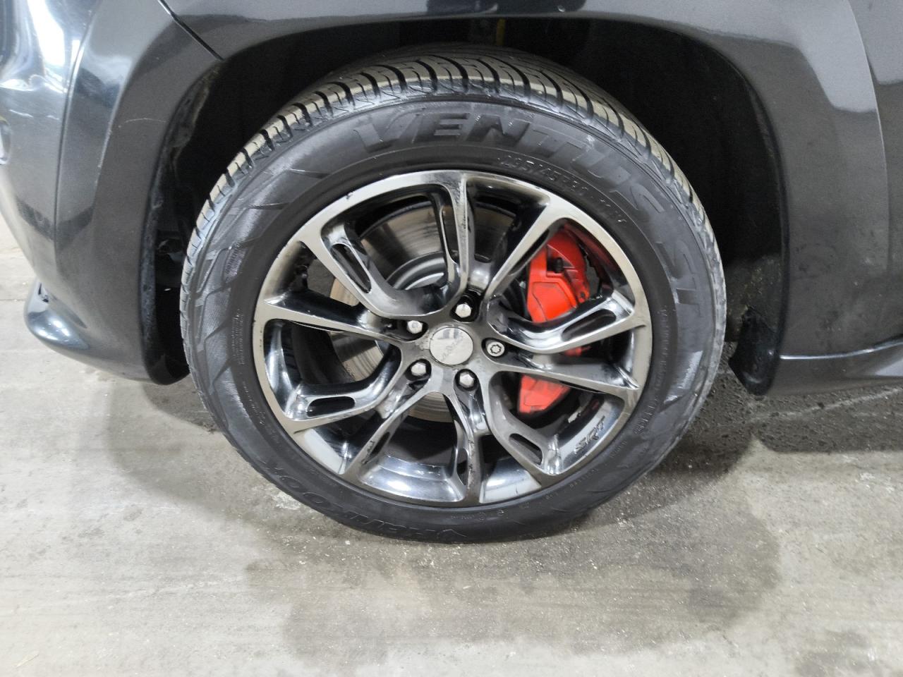 2012 Jeep Grand Cherokee Srt-8 Black vin: 1C4RJFDJ1CC289063 Damage: Left Front Wheel, Curb Rash, 1/2 To 1 Inch