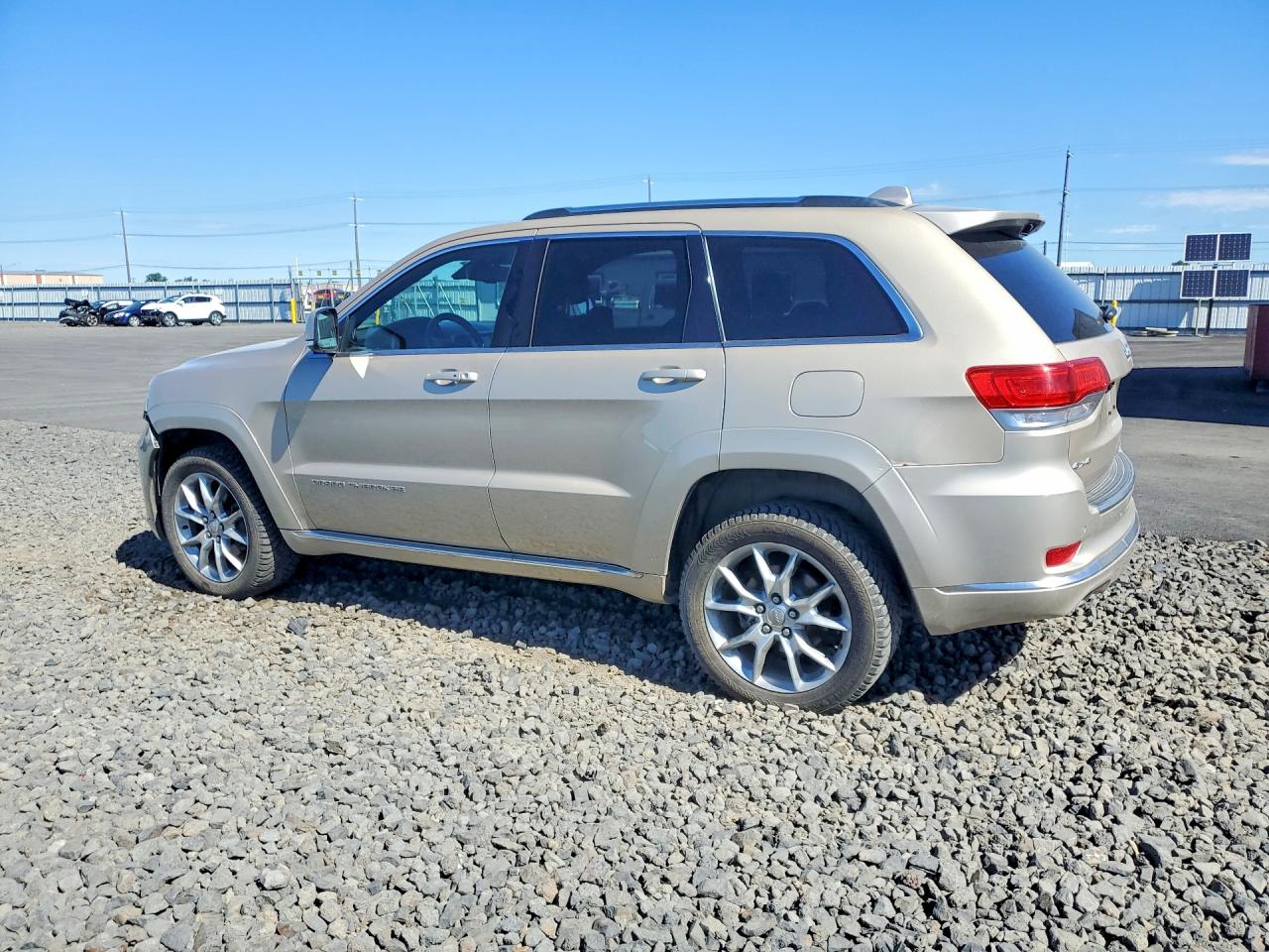 2015 Jeep Grand Cherokee Summit Tan vin: 1C4RJFJG6FC664331