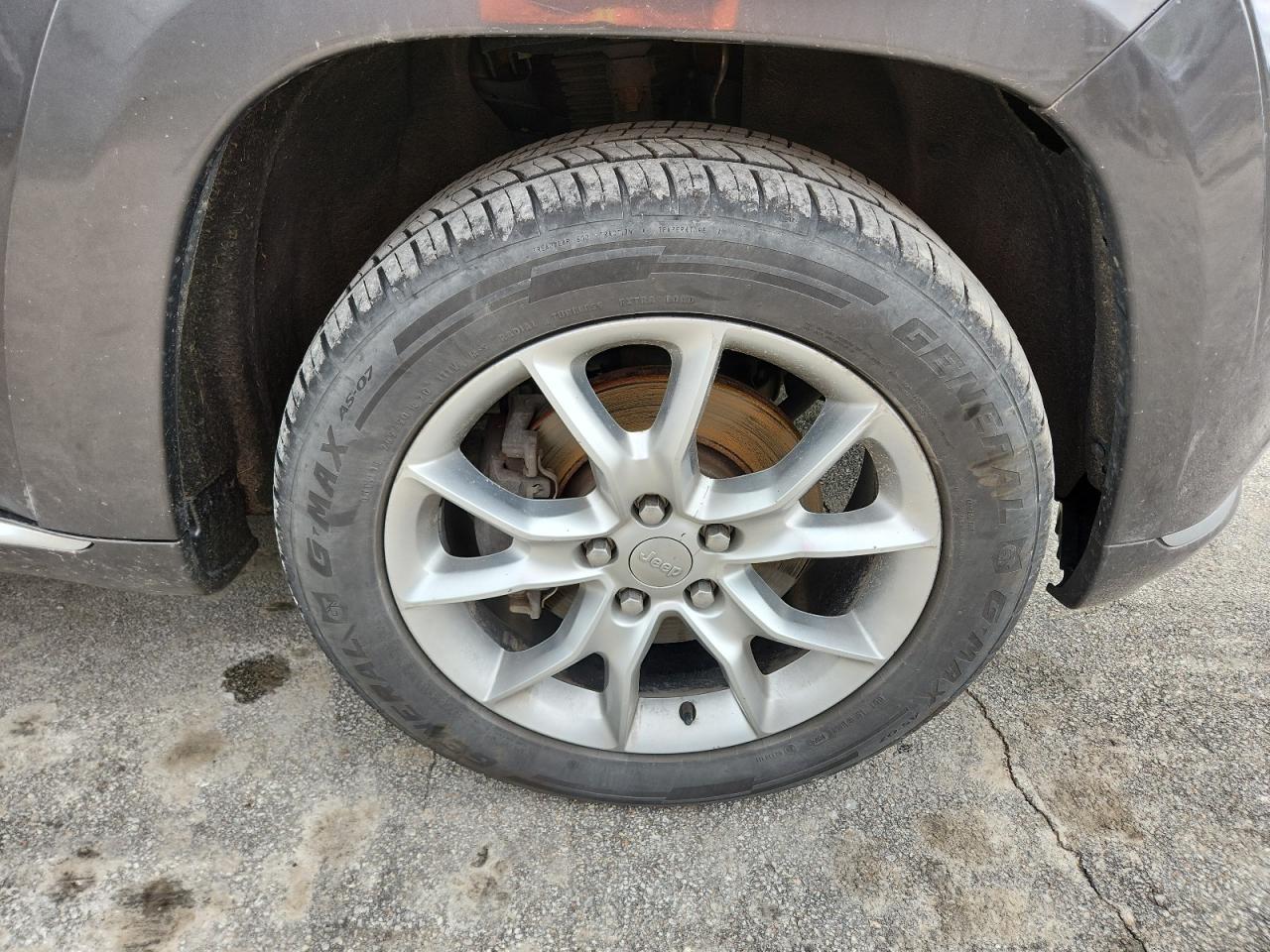 2015 Jeep Grand Cherokee Summit Charcoal vin: 1C4RJFJT6FC764958 Damage: Right Front Wheel, Curb Rash, > 12 Inches