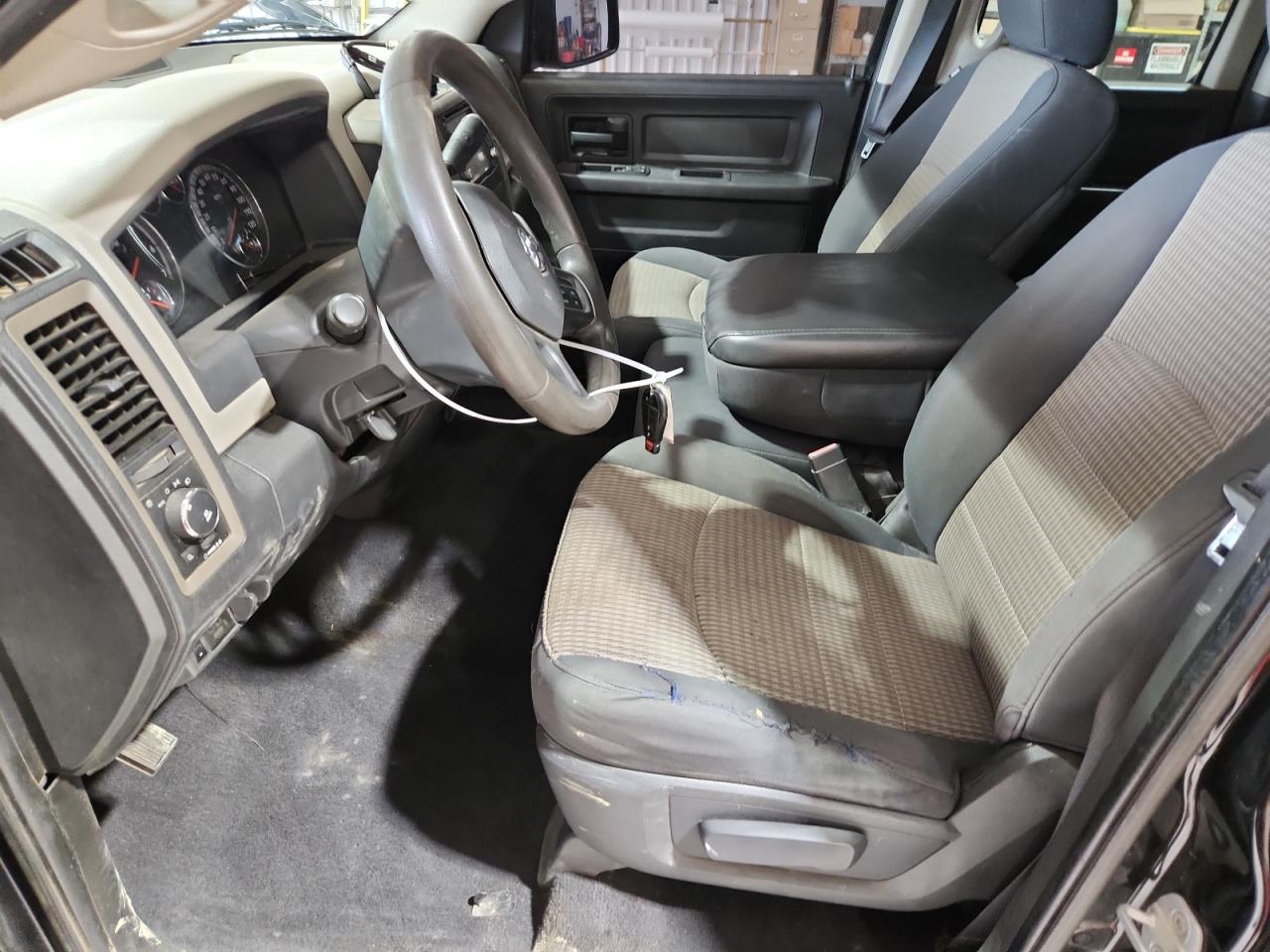2012 Dodge Ram 1500 St Black vin: 1C6RD7FTXCS343288 Damage: Left Front Seat Cushion, Worn, Replacement Required