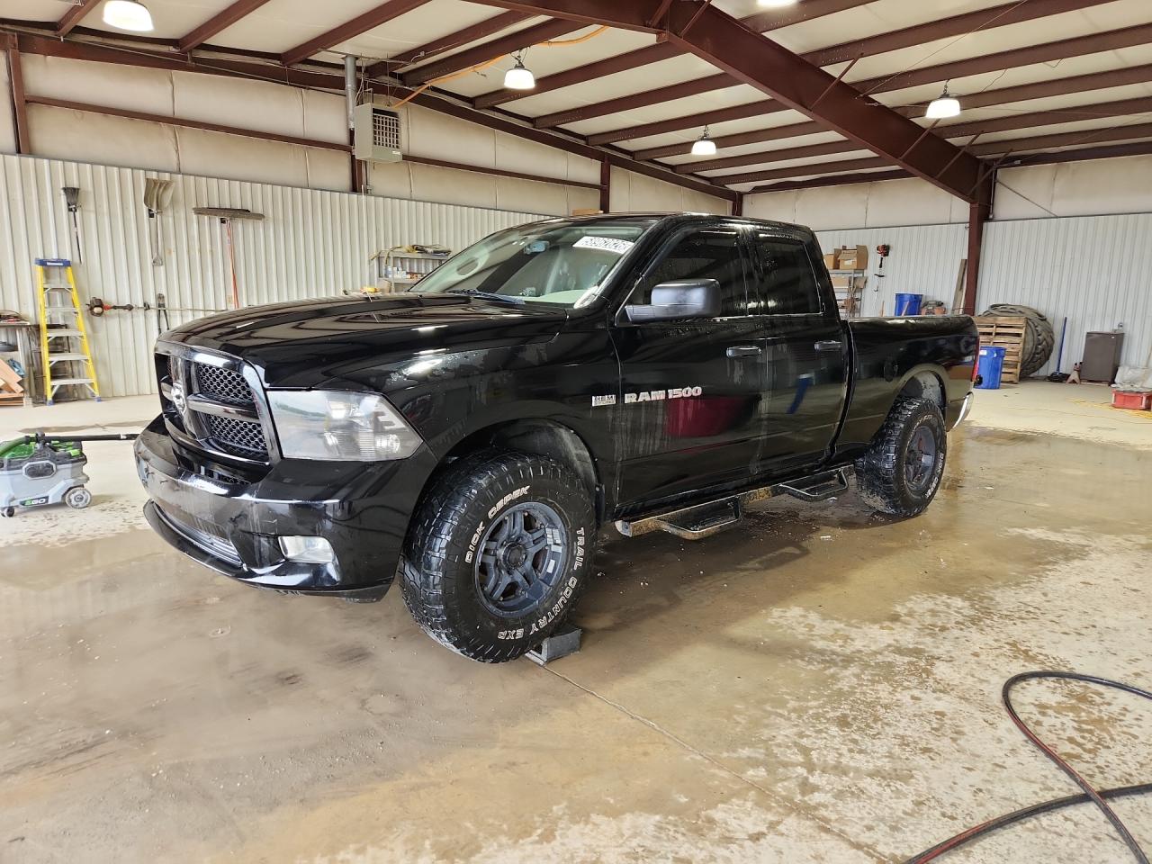 2012 Dodge Ram 1500 St Black vin: 1C6RD7FTXCS343288 Damage: Left Front Wheel, Aftermarket, Acceptable