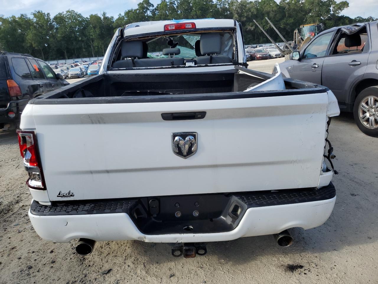2014 Ram 1500 St White vin: 1C6RR6FT7ES101671 Damage: Tailgate, Dent(s) W/ Paint Dmg, 1 to 2 inches