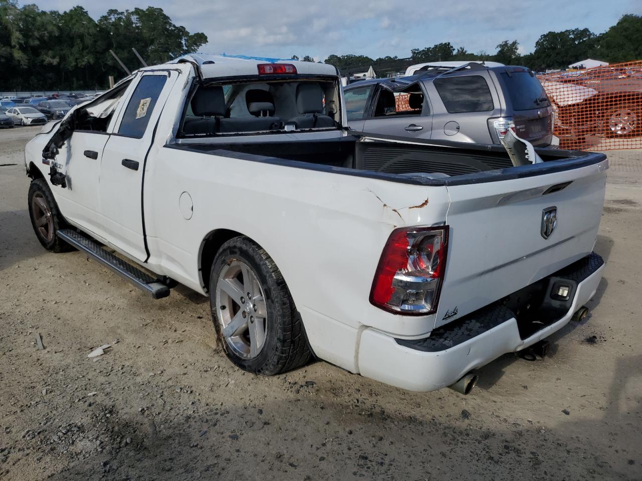 2014 Ram 1500 St White vin: 1C6RR6FT7ES101671 Damage: Left Rear Door, Dent(s) W/ Paint Dmg, > 12 inches