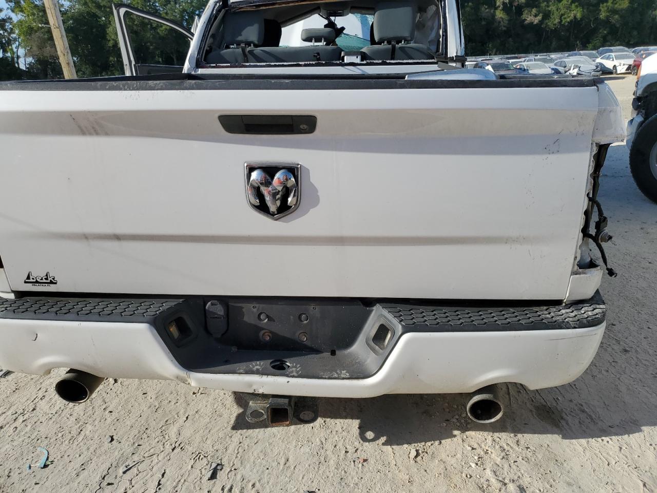 2014 Ram 1500 St White vin: 1C6RR6FT7ES101671 Damage: Rear Metal Bumper Painted, Dent(s) W/No Paint Dmg, > 12 inches