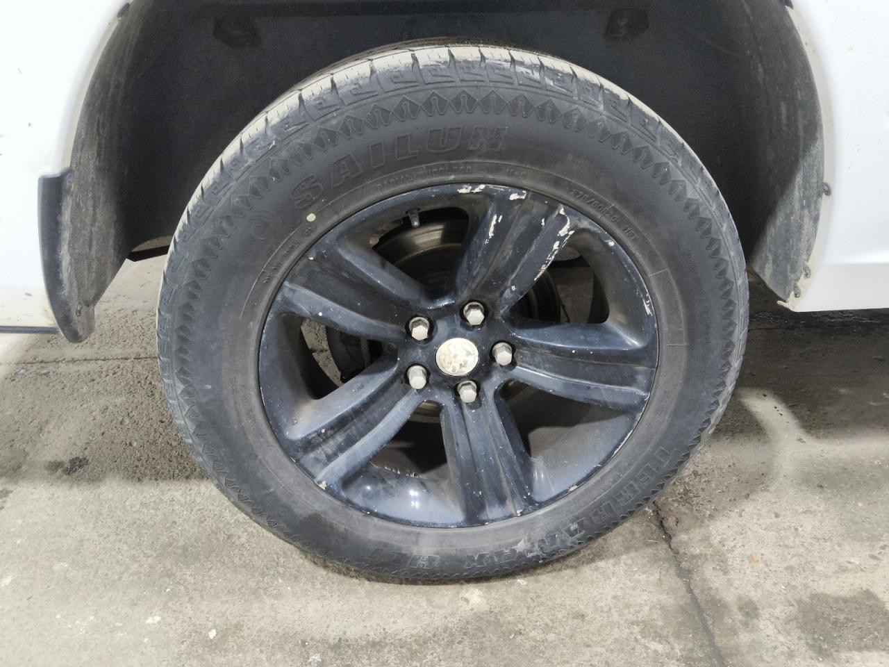 2015 Ram 1500 Sport White vin: 1C6RR6HT5FS661025 Damage: Right Rear Wheel, Curb Rash, 5 To 6 Inches
