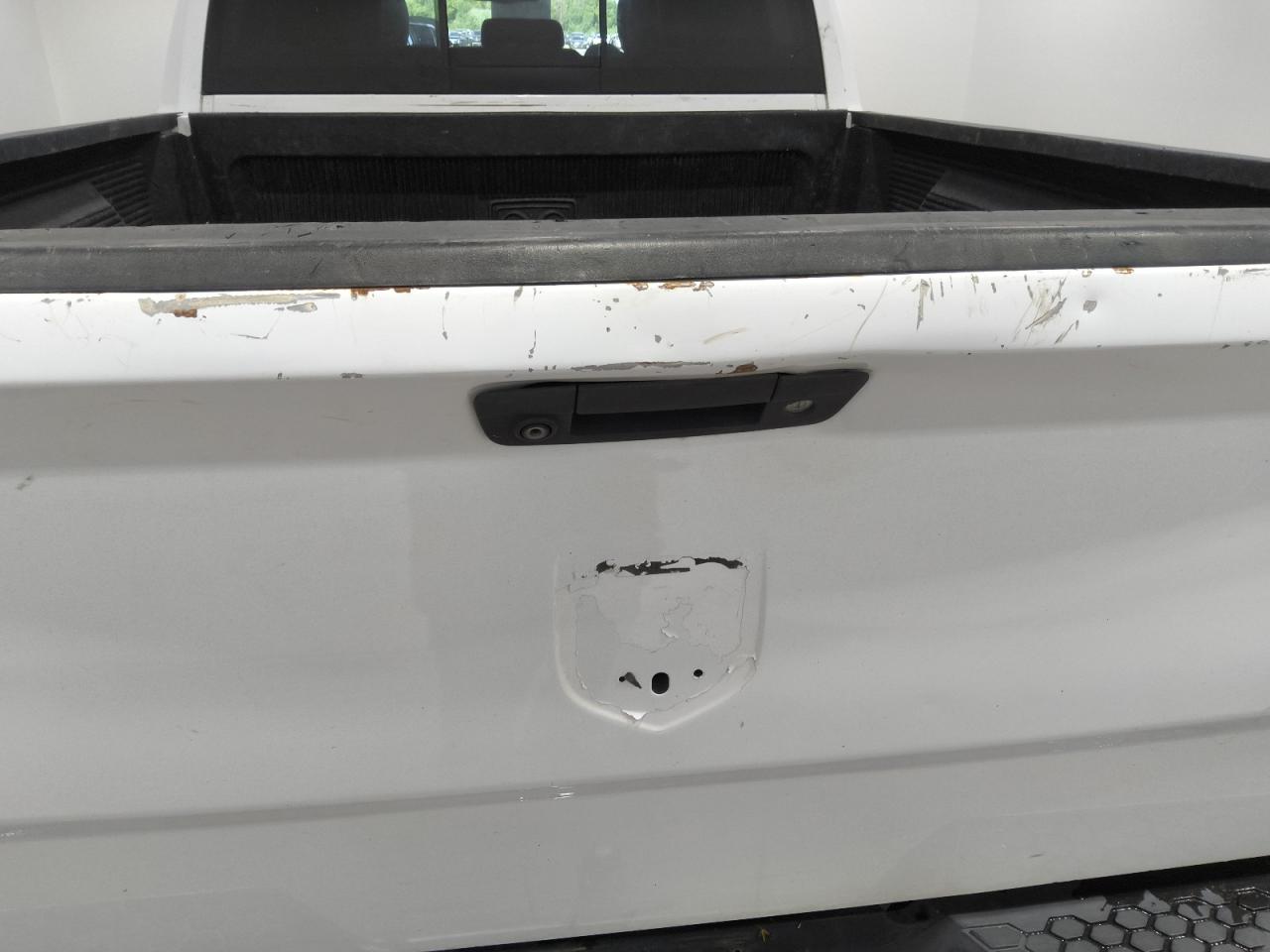 2015 Ram 1500 Sport White vin: 1C6RR6HT5FS661025 Damage: Tailgate, Dent(S) W/ Paint Dmg, 2 To 3 Inches