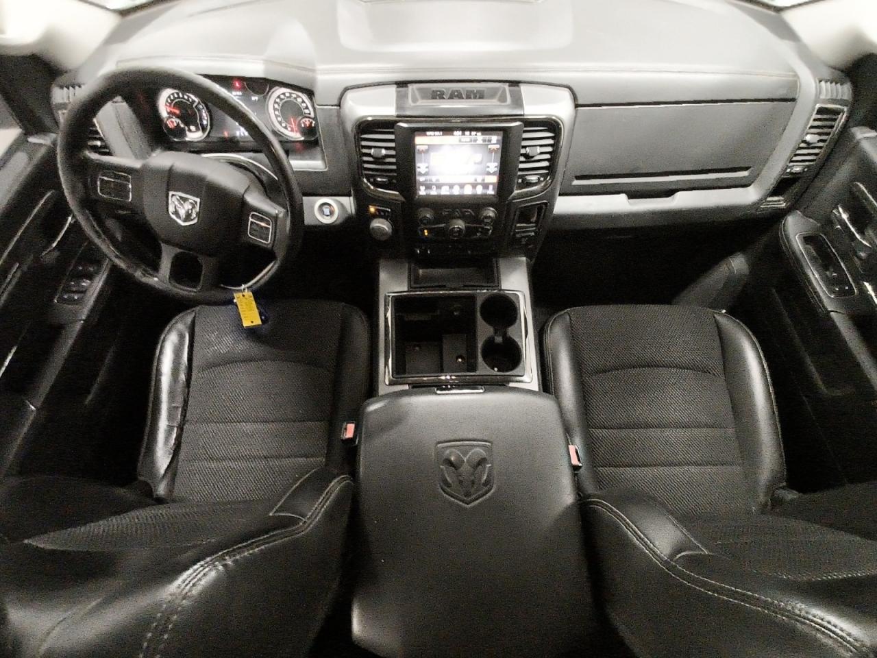 2015 Ram 1500 Sport White vin: 1C6RR6HT5FS661025 Damage: Left Front Seat Cushion, Worn, Acceptable