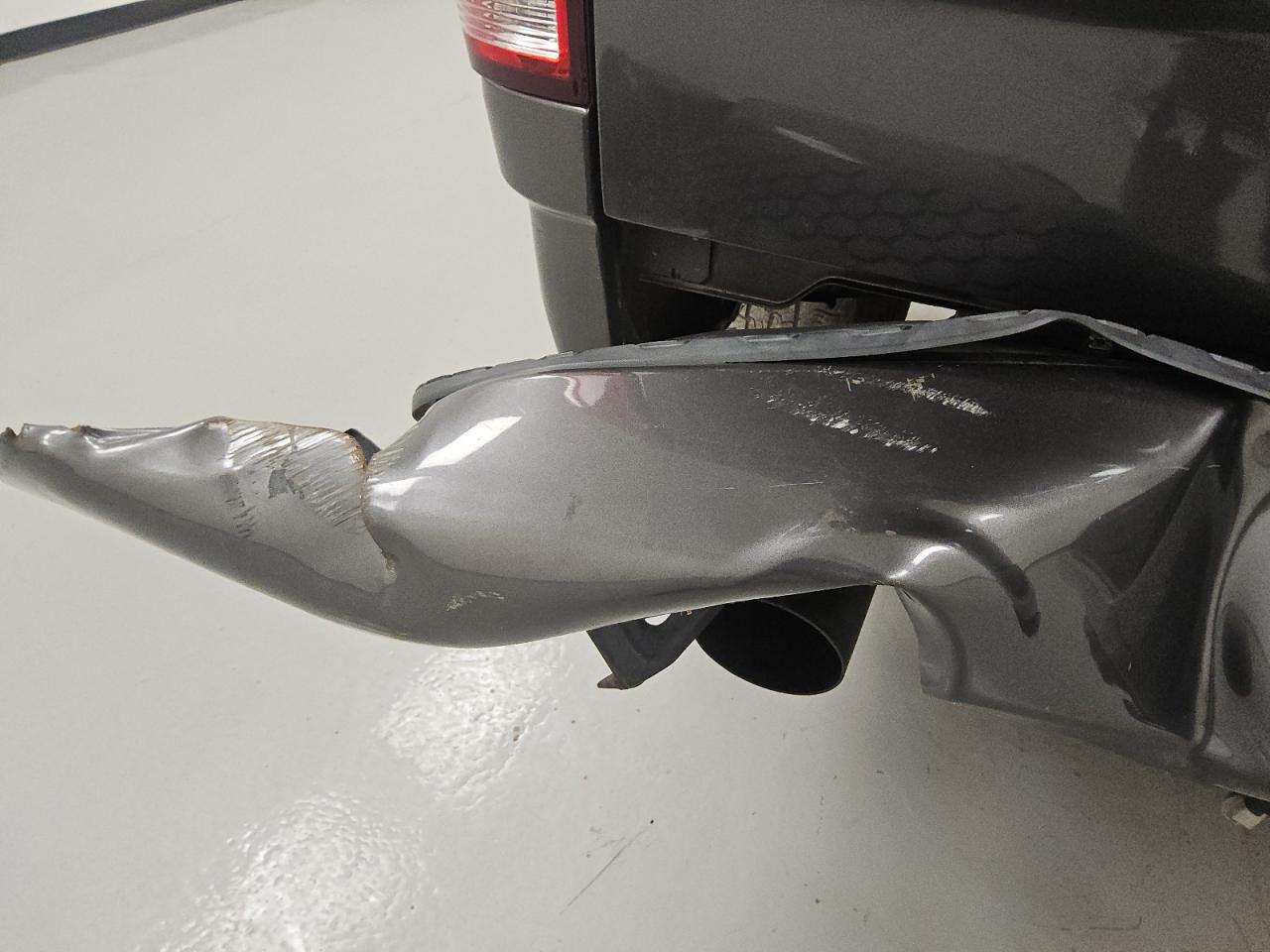 2014 Ram 1500 St Gray vin: 1C6RR6KT1ES272213 Damage: Rear Metal Bumper Painted, Broken, Replacement Required