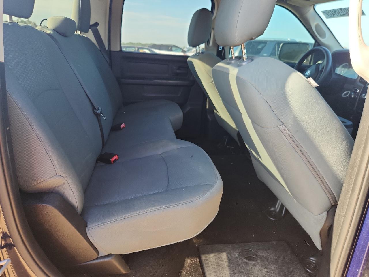 2015 Ram 1500 St Blue vin: 1C6RR6KT7FS592069 Damage: Right Rear Seat, Burn Hole, 1/8 To 1/2 Inch
